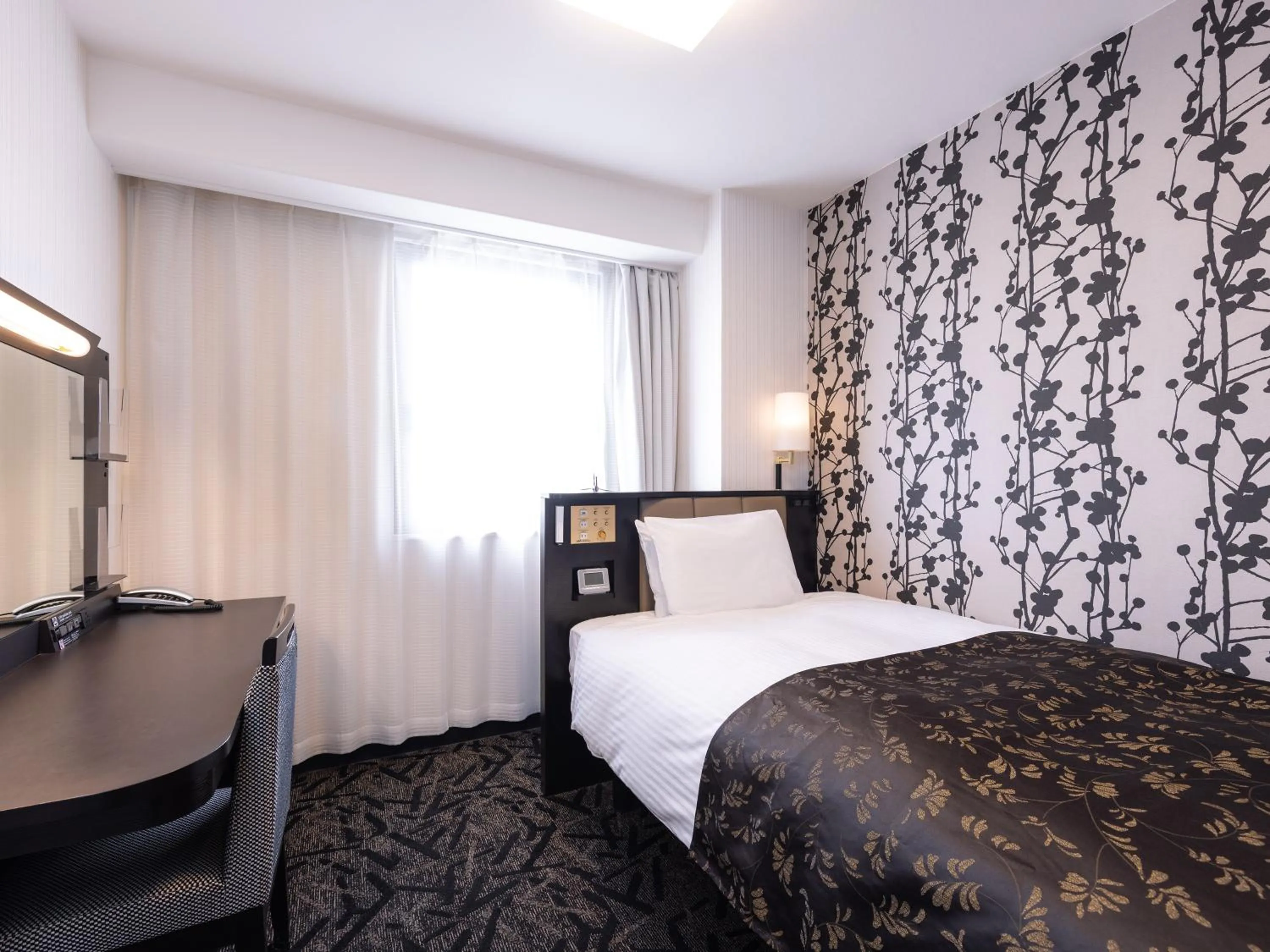 Photo of the whole room, Bed in APA Hotel Saga Ekimae Chuo