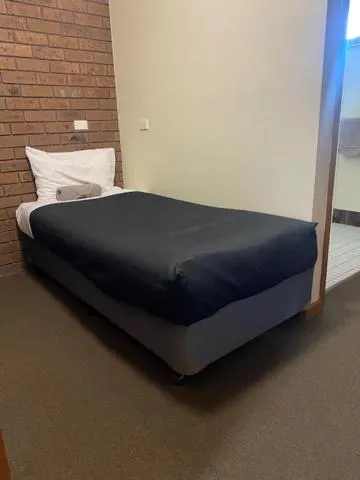 Bed in Allara Motor Lodge