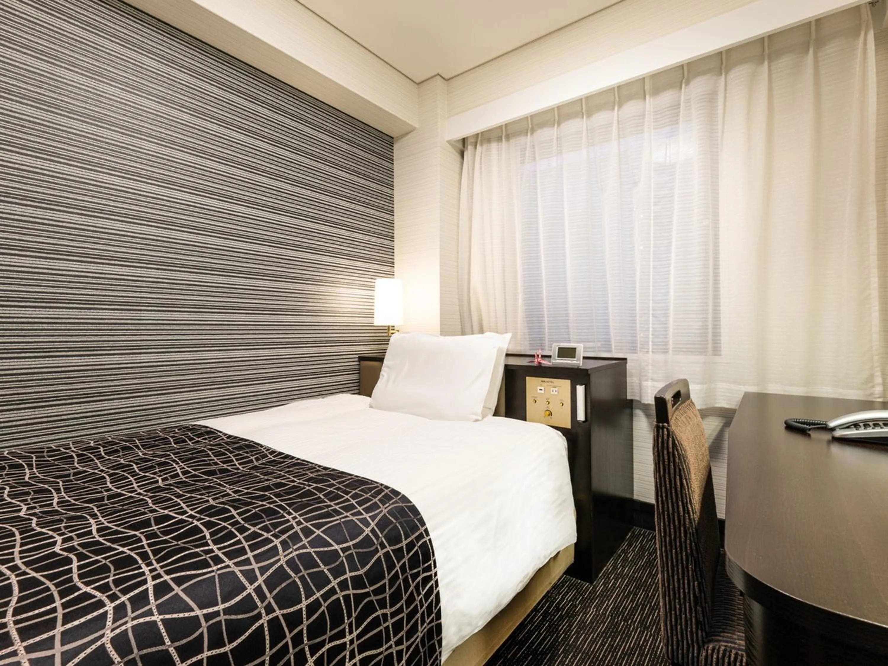 Photo of the whole room, Bed in APA Hotel Nagasaki Ekiminami