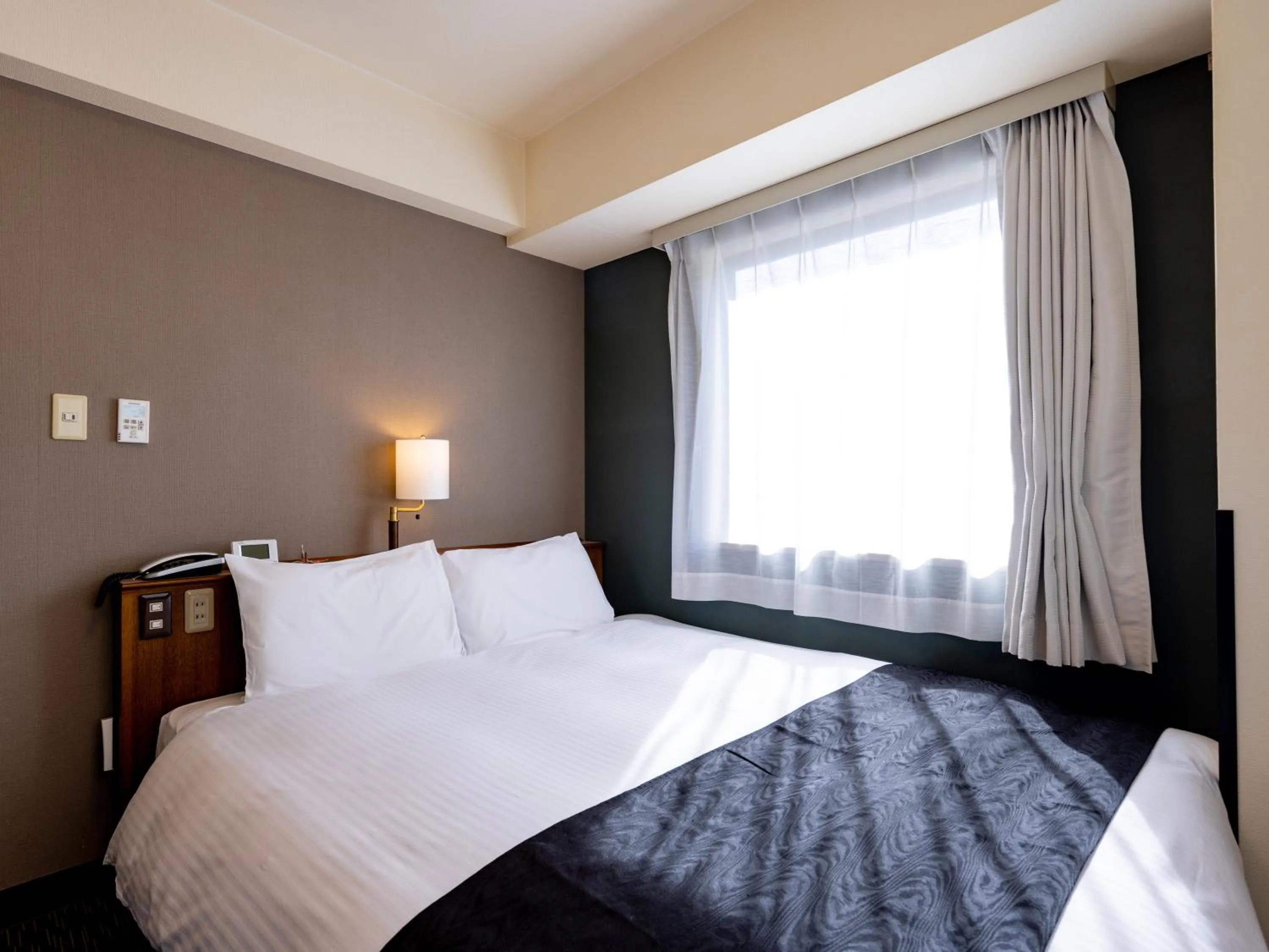 Photo of the whole room, Bed in APA Hotel Sendai Kotodai Koen