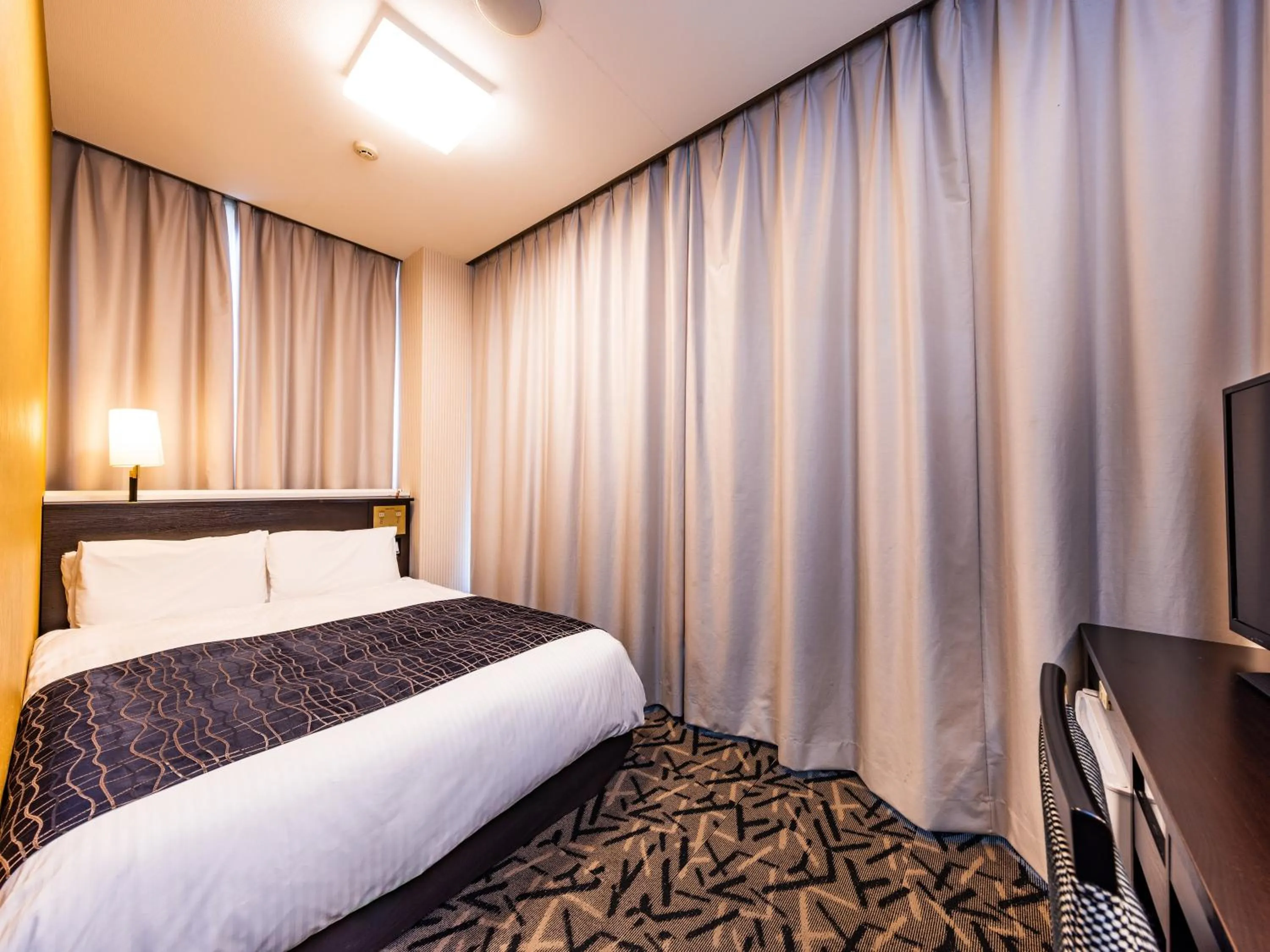 Photo of the whole room, Bed in APA Hotel Sendai Kotodai Koen