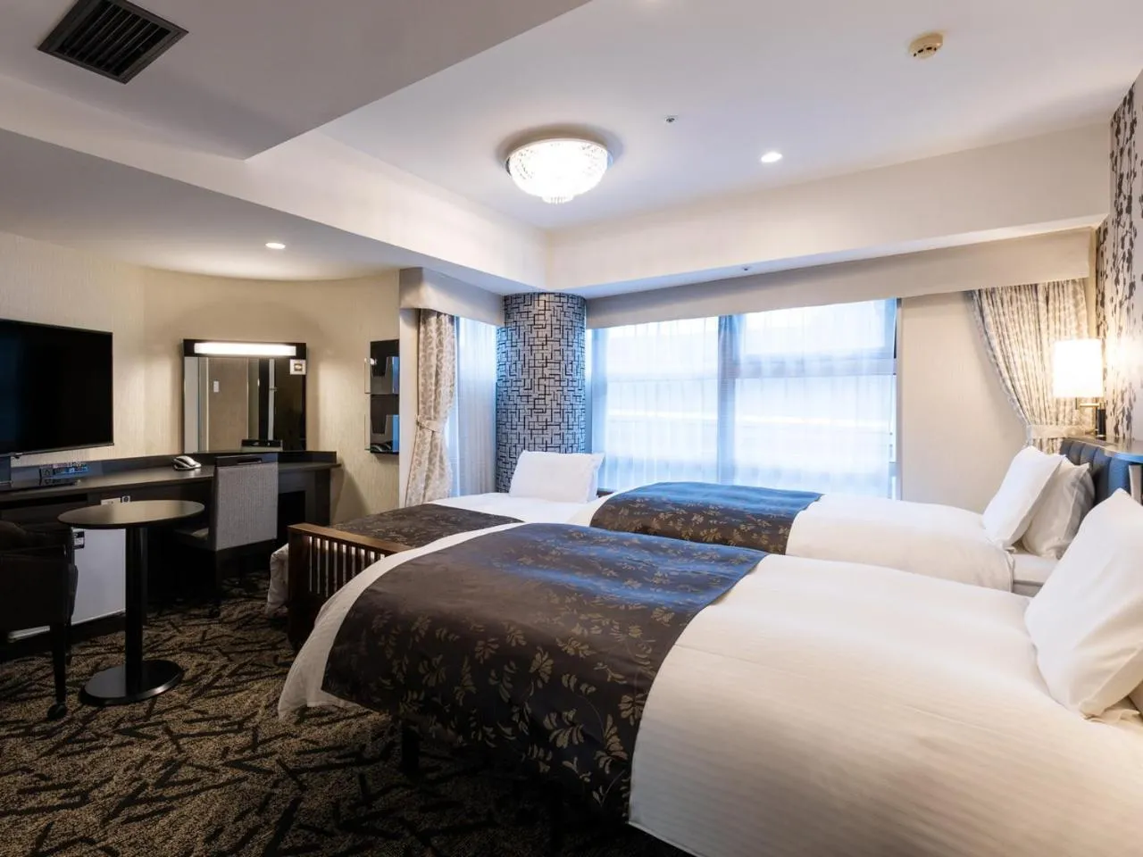 Bed in APA Hotel Kanazawa Ekimae