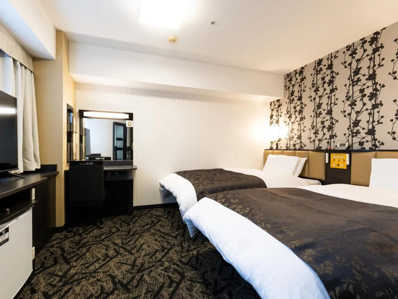 Bed in APA Hotel Kanazawa Ekimae