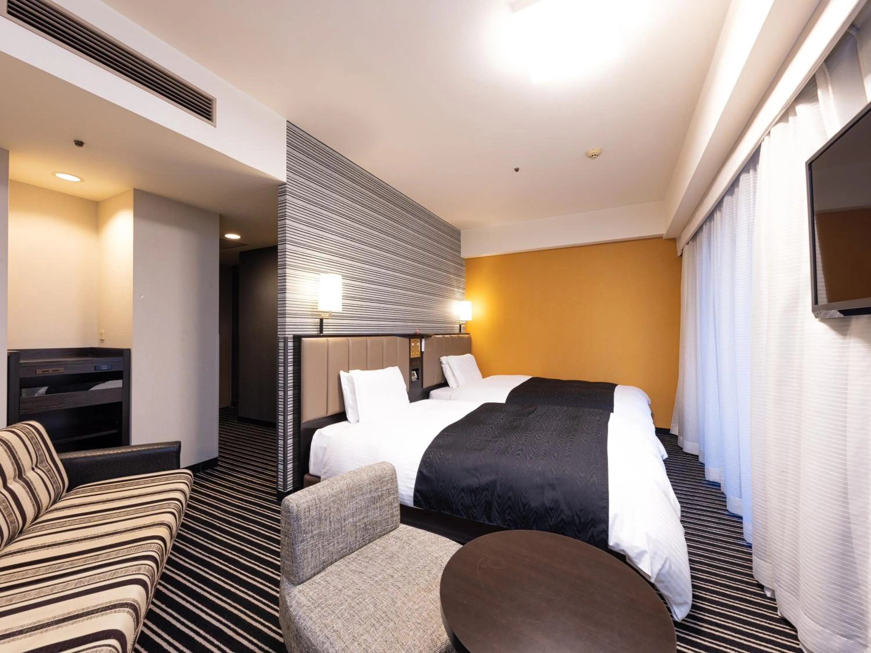 Photo of the whole room, Bed in APA Hotel Fukuoka Watanabedori Ekimae EXCELLENT