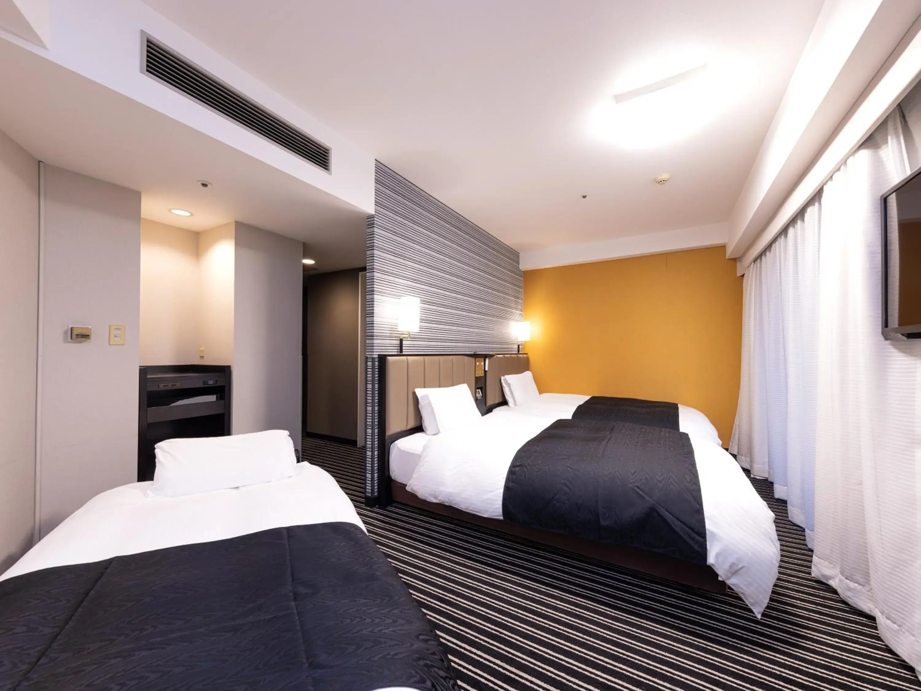 Standard Twin Room with Sofa Bed - Non-Smoking in APA Hotel Fukuoka Watanabedori Ekimae EXCELLENT Standard Twin Room with Sofa Bed - Non-Smoking in APA Hotel Fukuoka Watanabedori Ekimae EXCELLENT