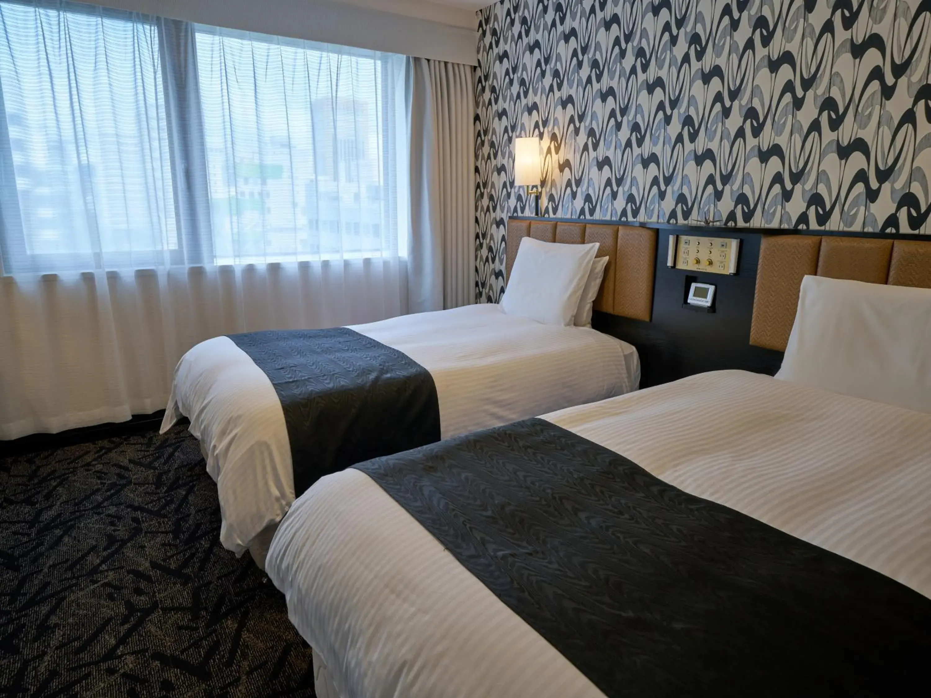 Twin Room - Non-Smoking in APA Hotel Okayama Ekimae Twin Room - Non-Smoking in APA Hotel Okayama Ekimae