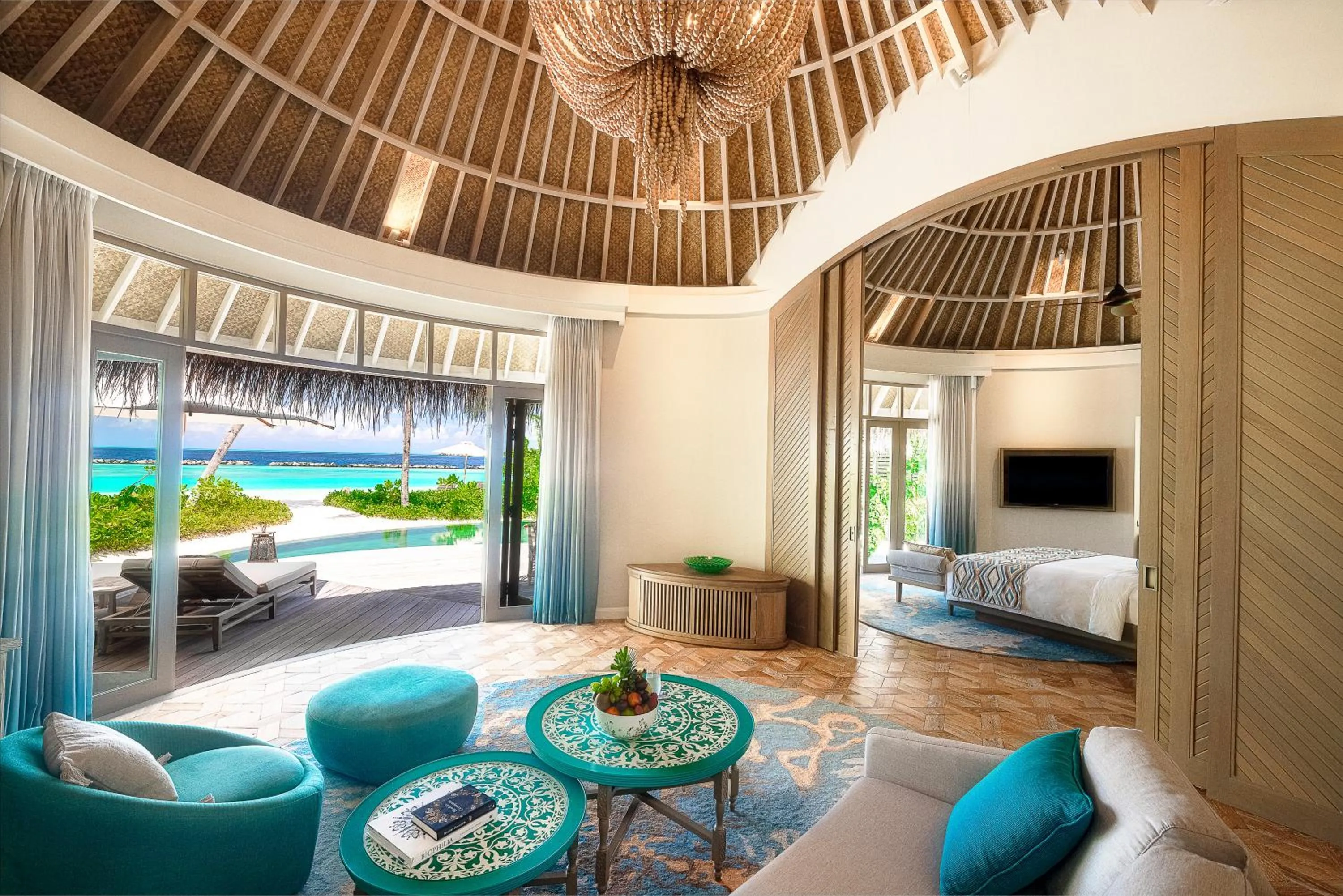 Living room, Bed in The Nautilus Maldives