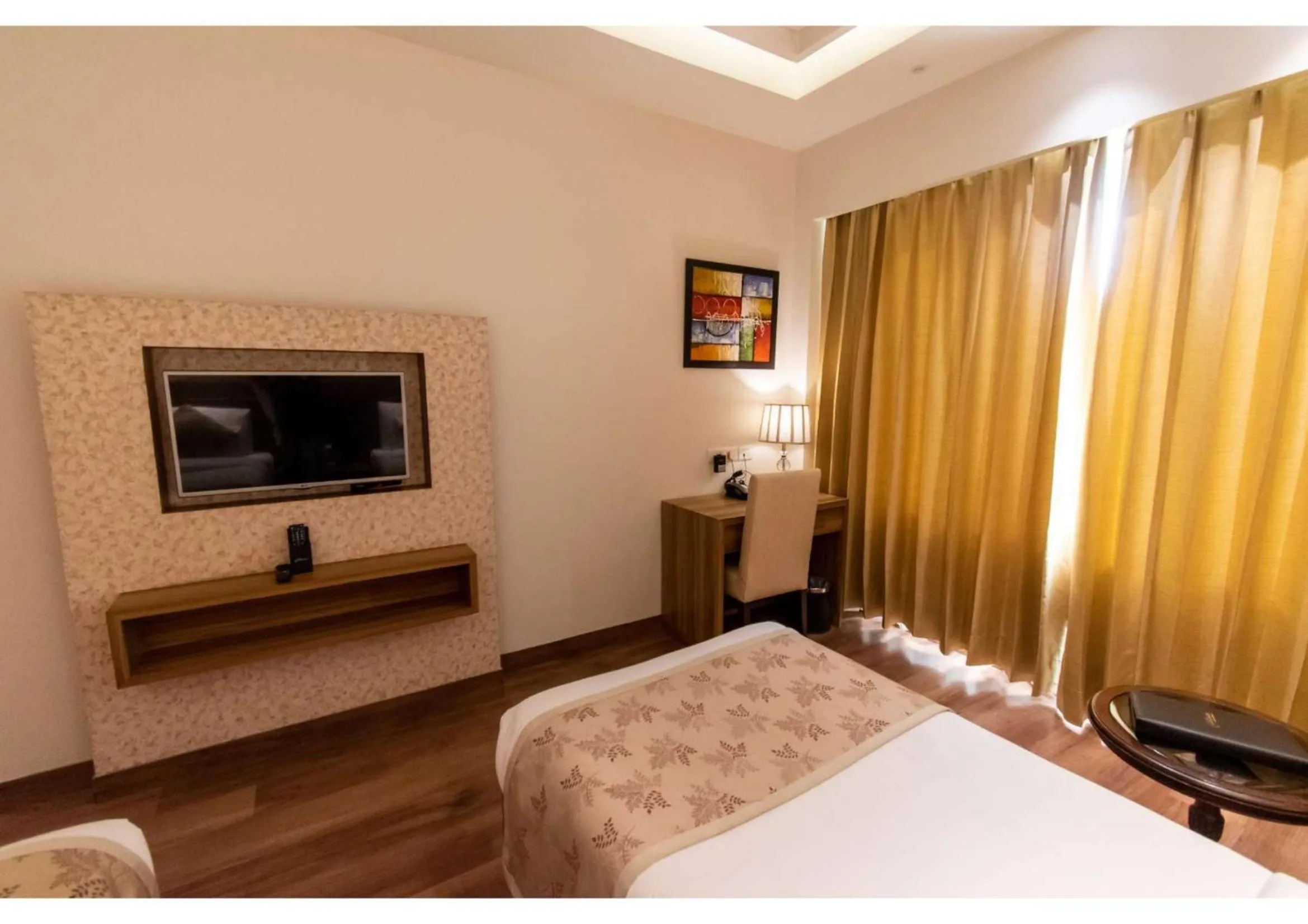 Bed in The Grand Ambassador