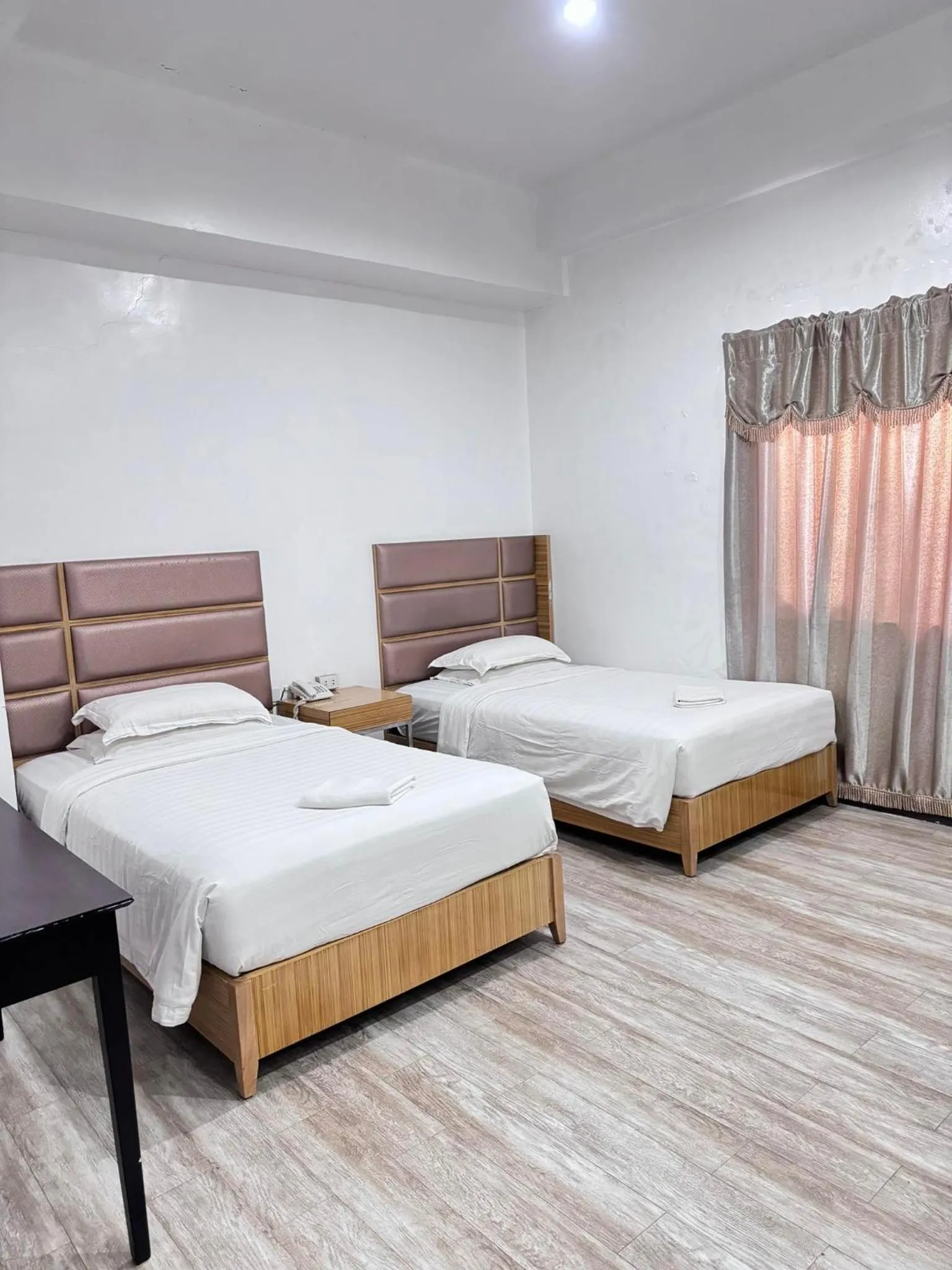 Bed in Jeamco Royal Hotel-Palawan