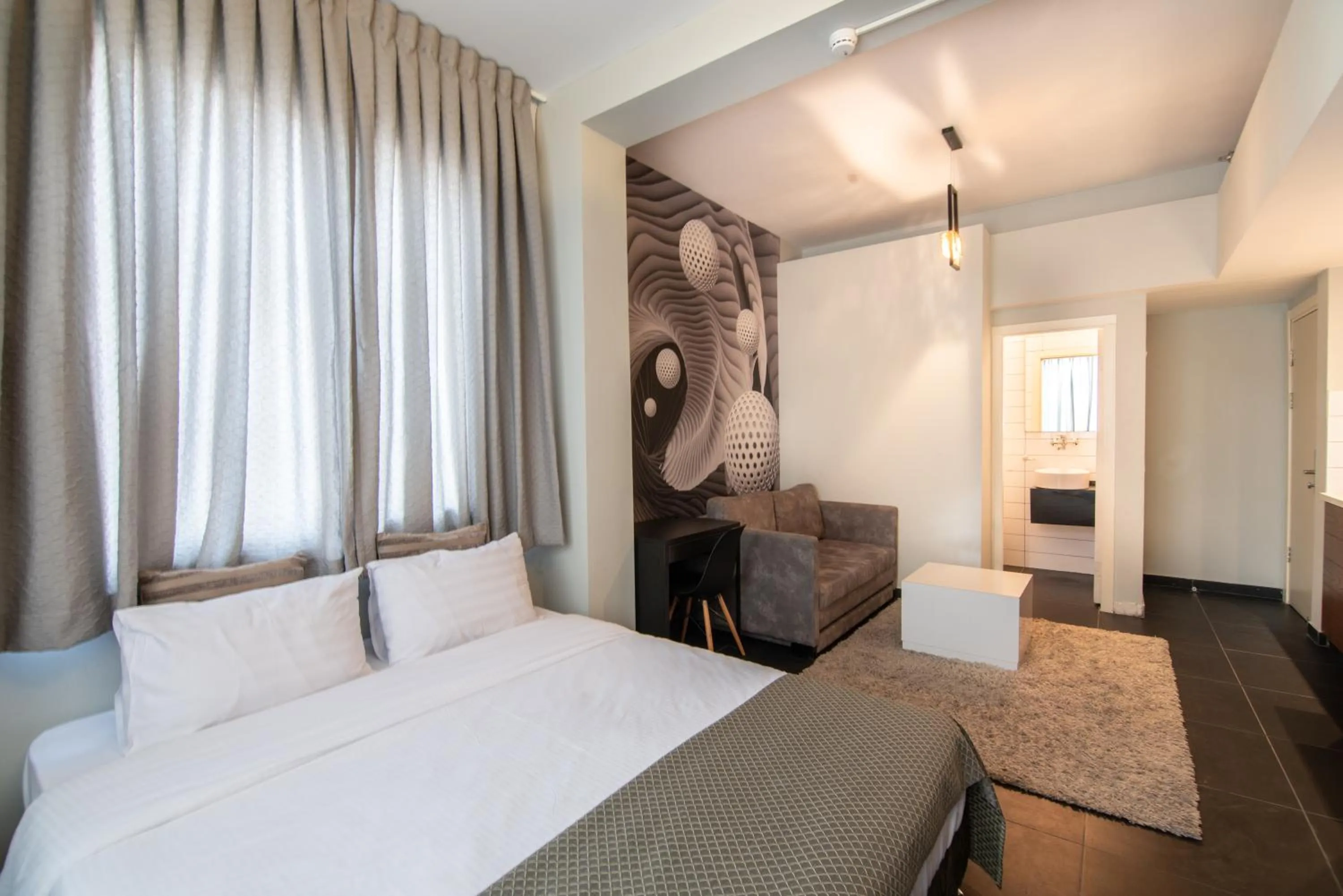 Decorative detail, Bed in 27Montefiore - Urban ApartHotel TLV