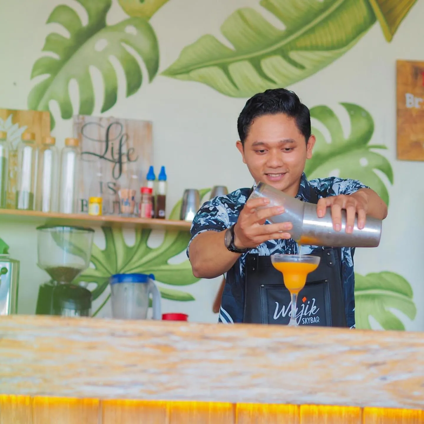 Lounge or bar in Luminor Hotel Banyuwangi By WH