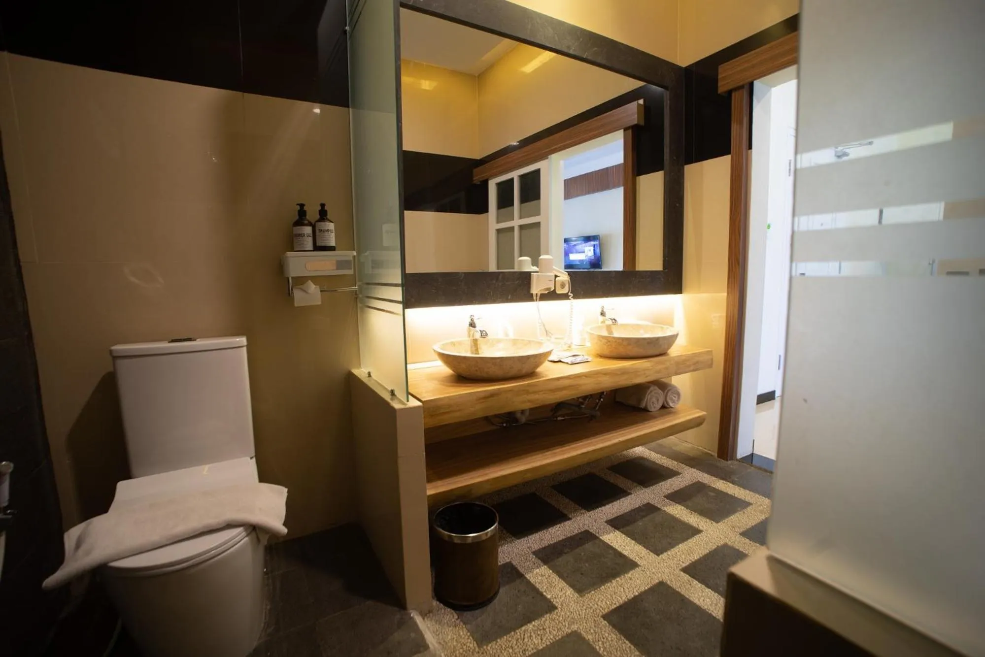 Bathroom in Luminor Hotel Banyuwangi By WH