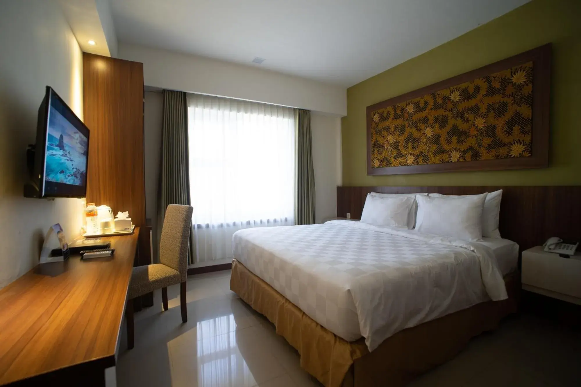 Deluxe Double Room in Luminor Hotel Banyuwangi By WH Deluxe Double Room in Luminor Hotel Banyuwangi By WH