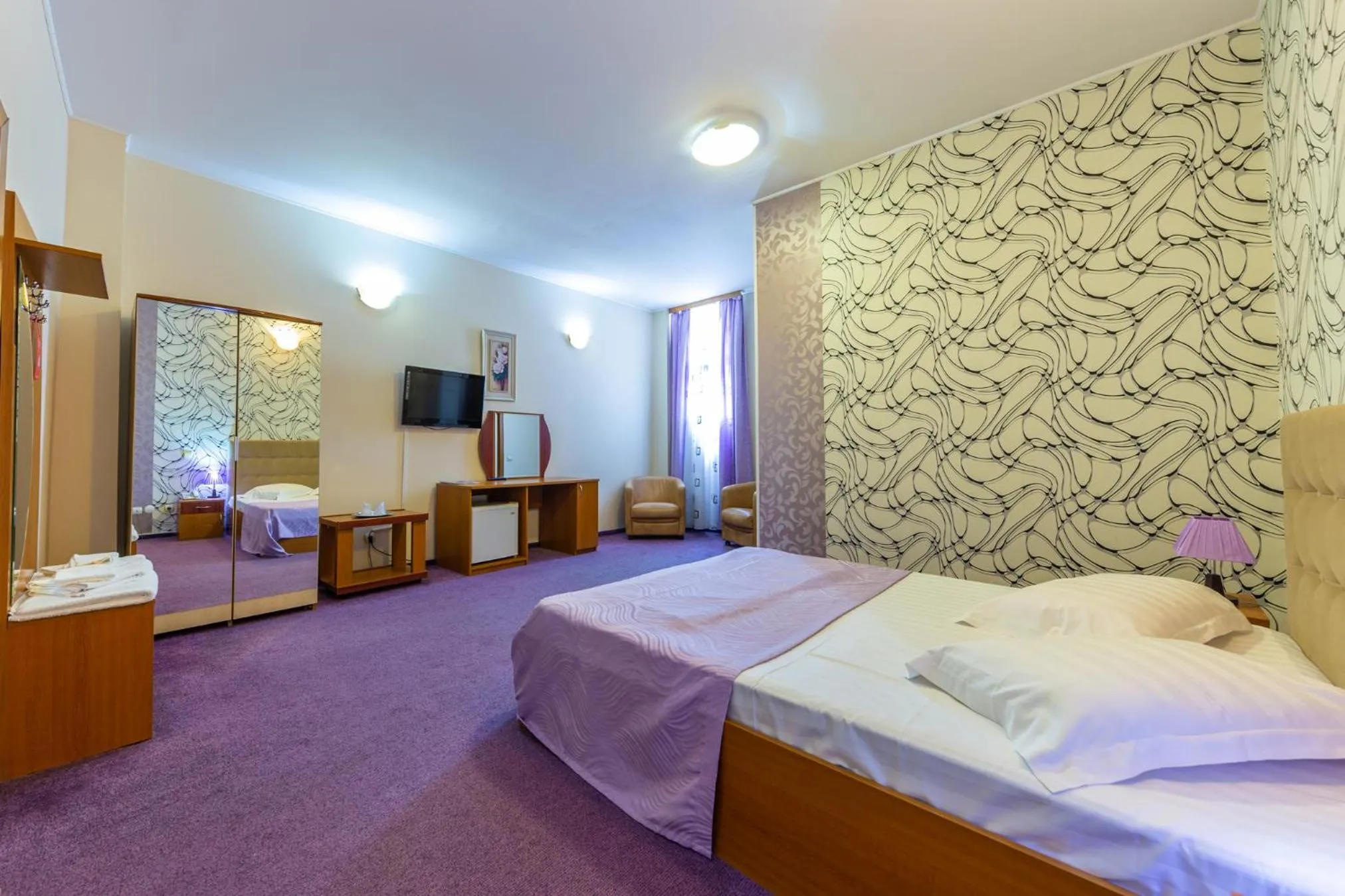 Bed in Hotel Amphitryon