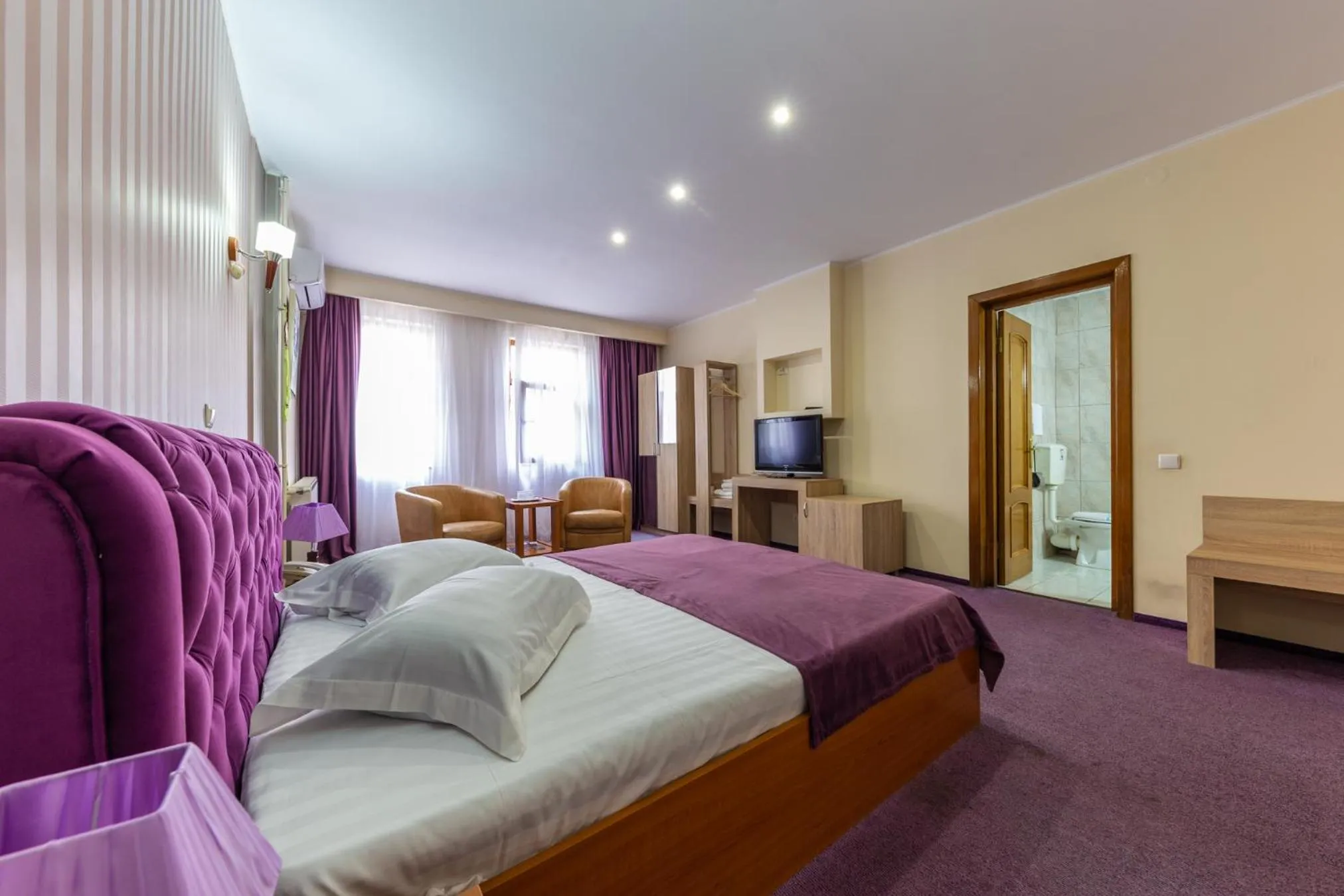 Bed in Hotel Amphitryon