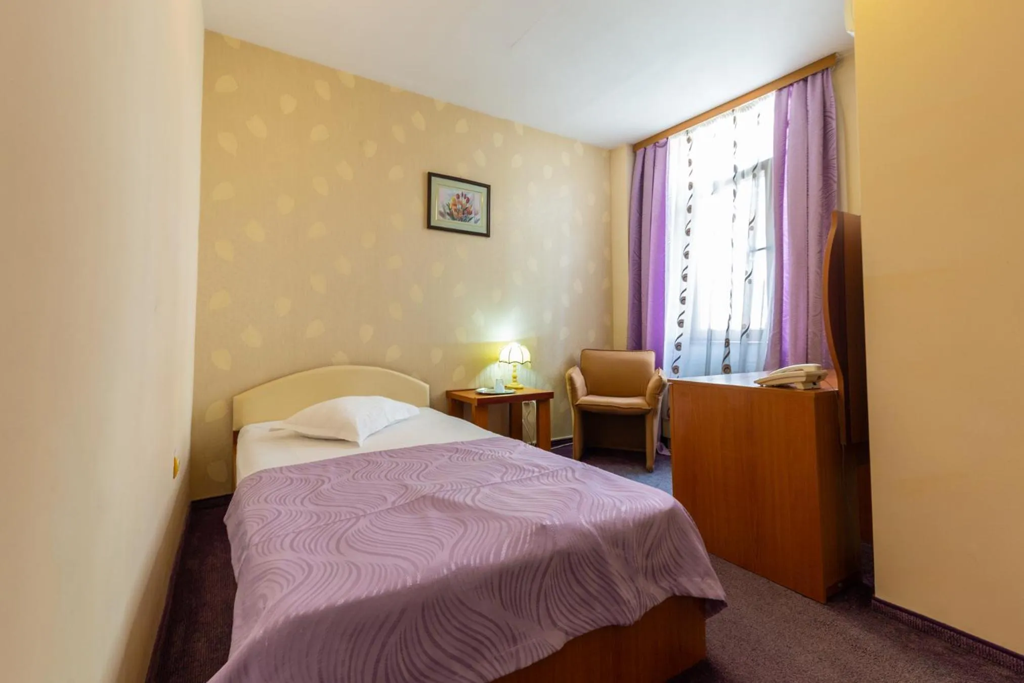 Bed in Hotel Amphitryon