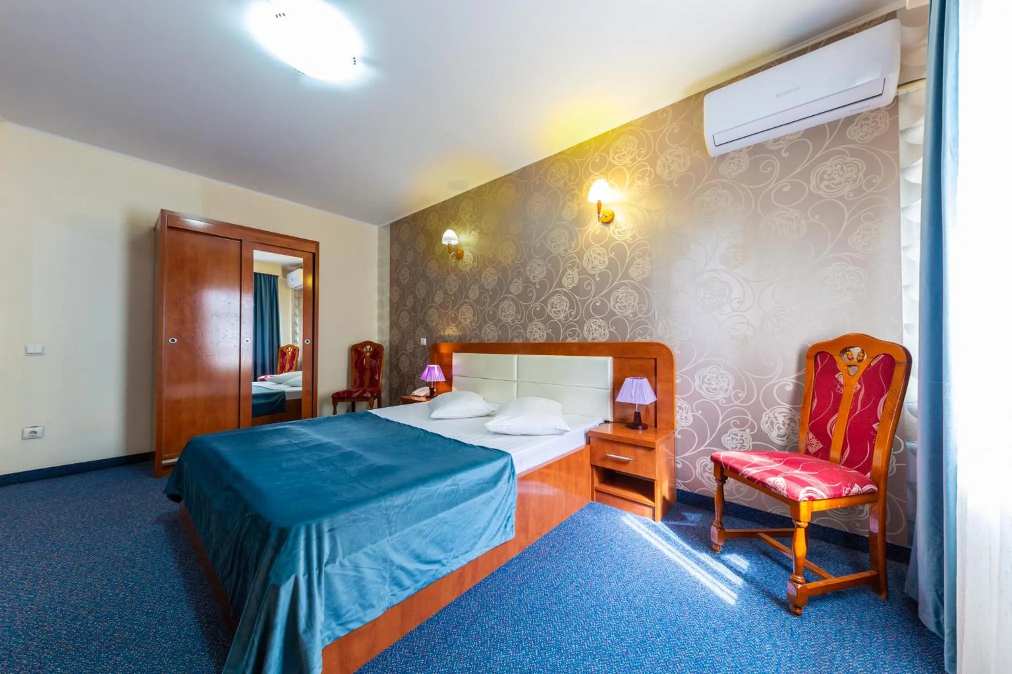 Bed in Hotel Amphitryon