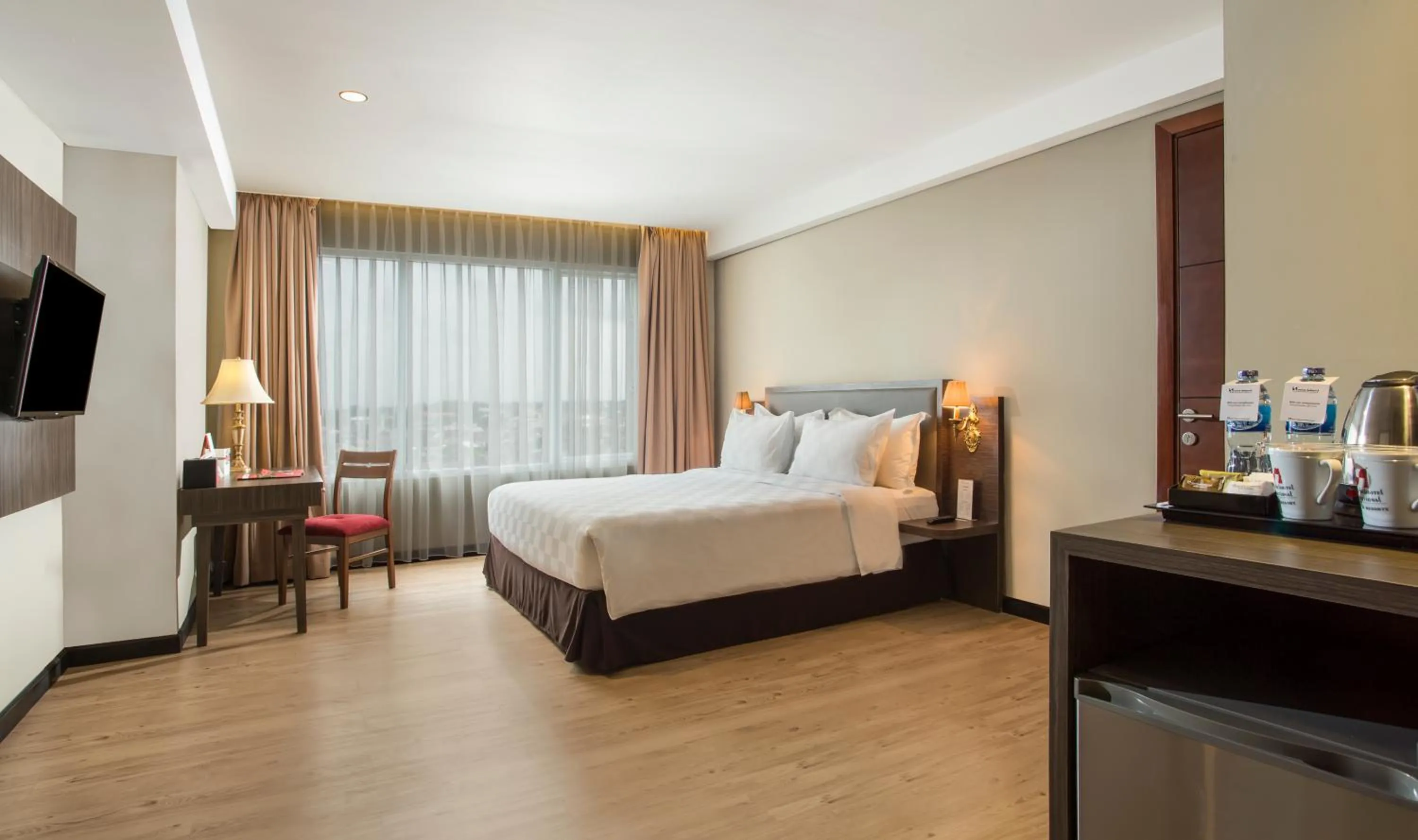 Photo of the whole room, Bed in Swiss-Belhotel Pangkalpinang
