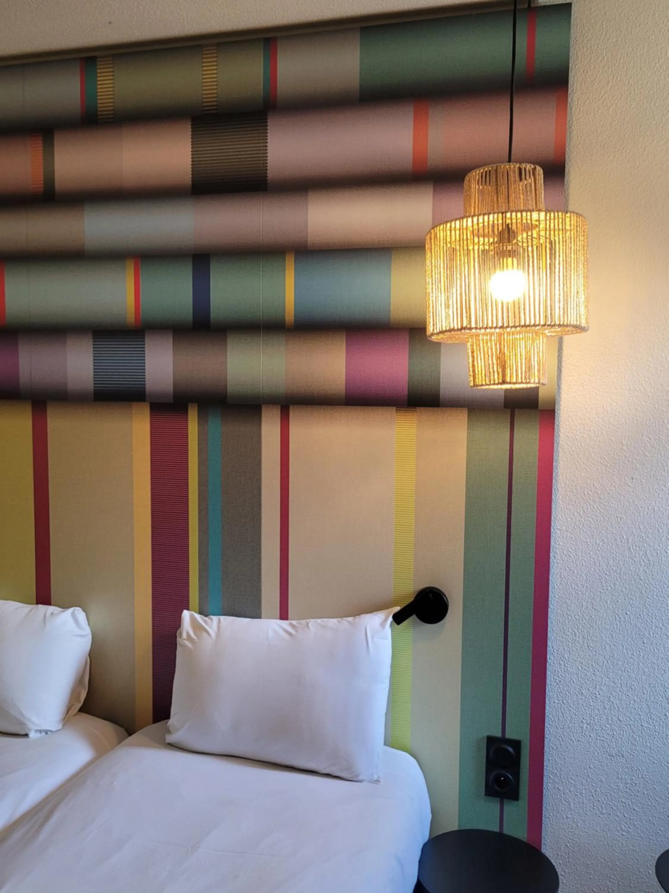 Decorative detail, Bed in ibis Styles Perpignan Centre Gare