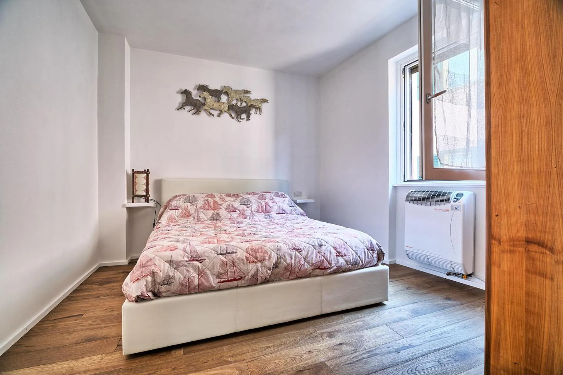 Bed in Marina Apartments