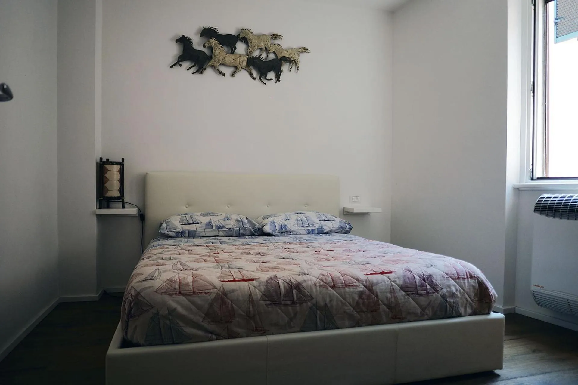 Bed in Marina Apartments