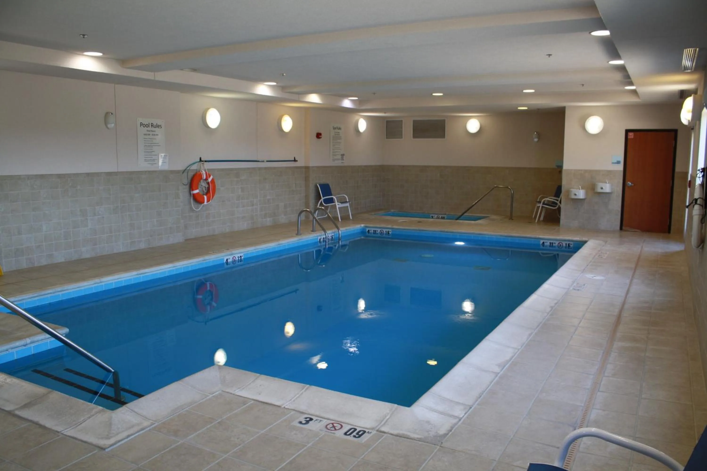Swimming pool in Holiday Inn Express & Suites Morton Peoria Area by IHG