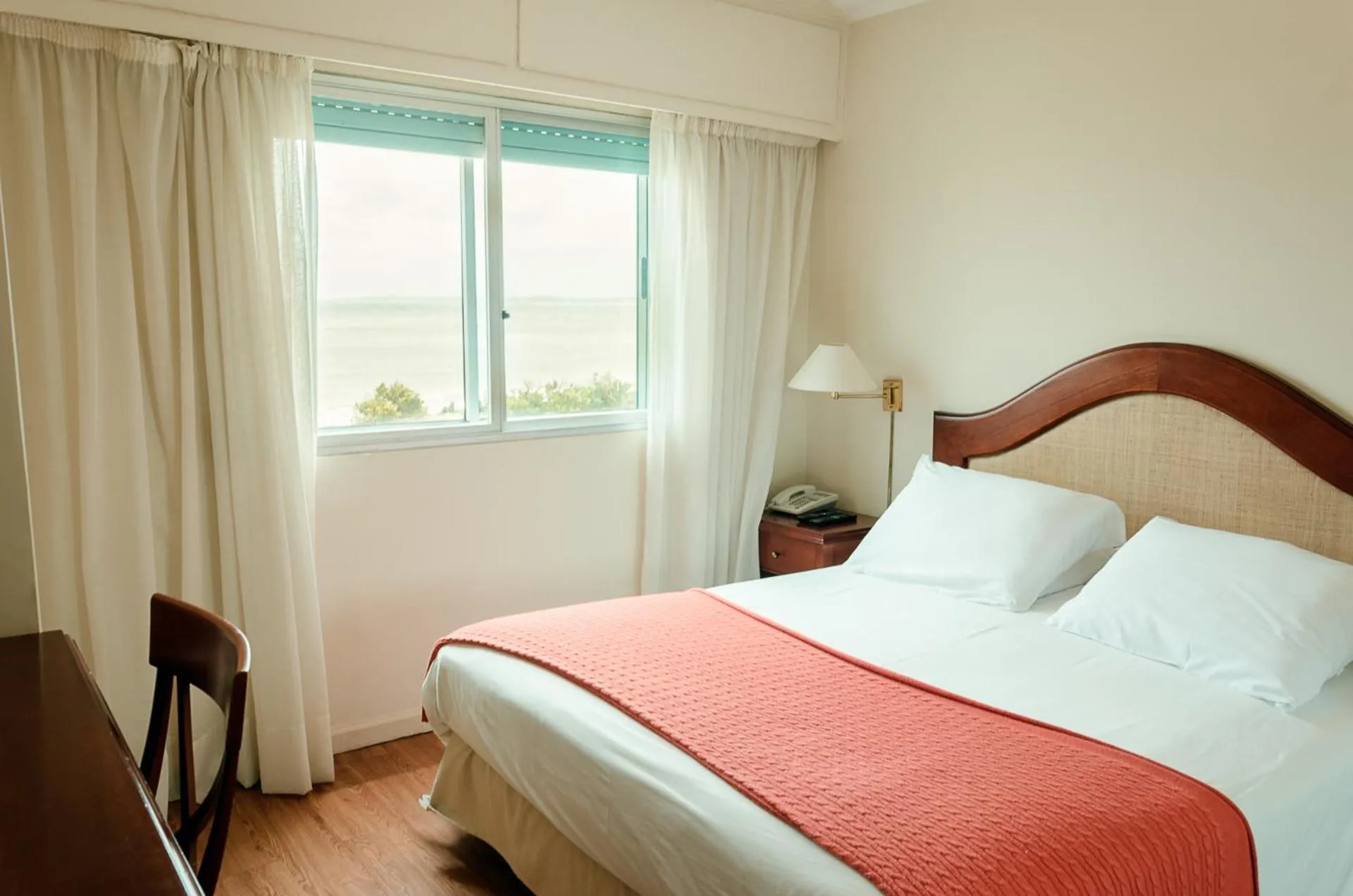 Bed in Hotel Sunset Beach