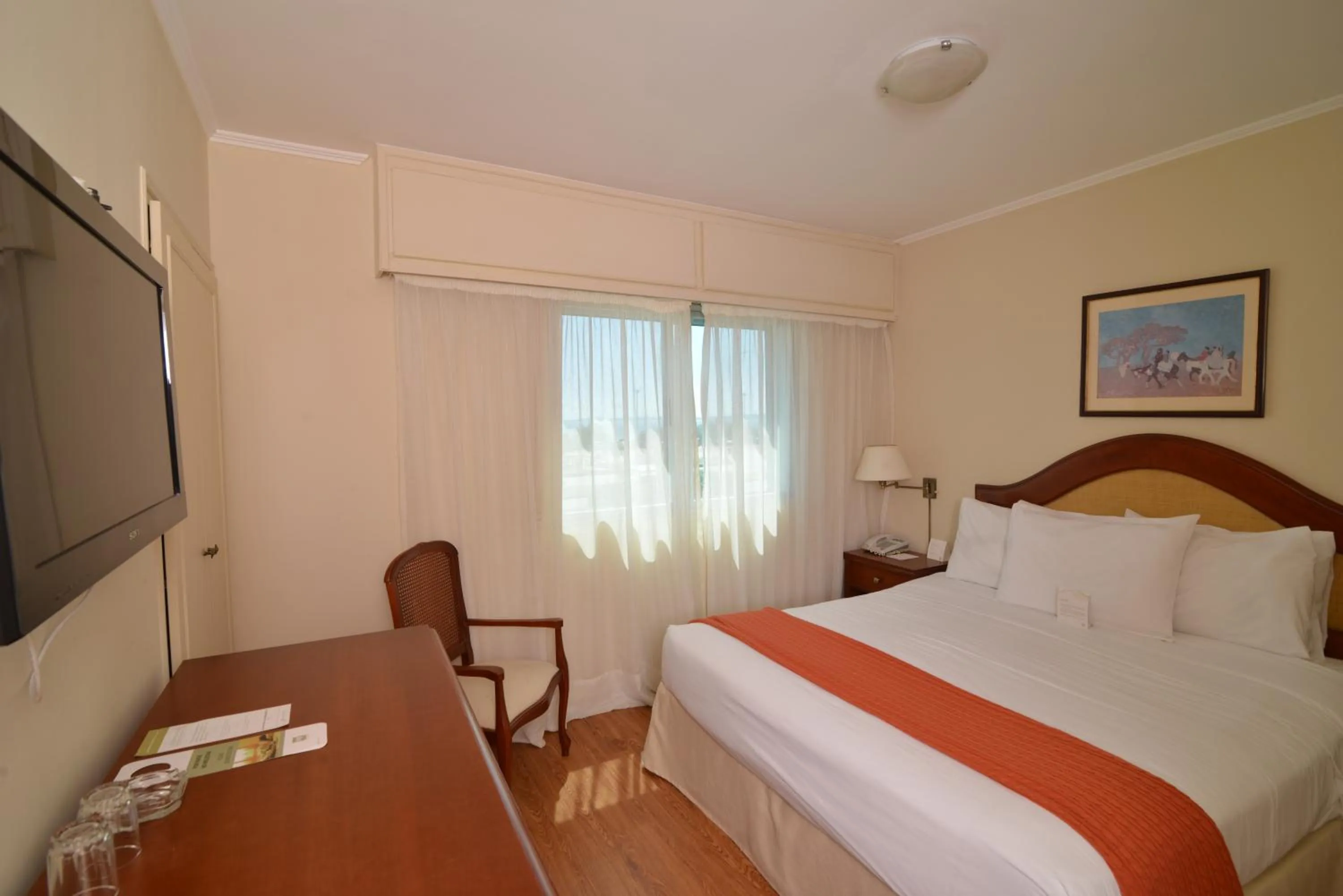 Bed in Hotel Sunset Beach