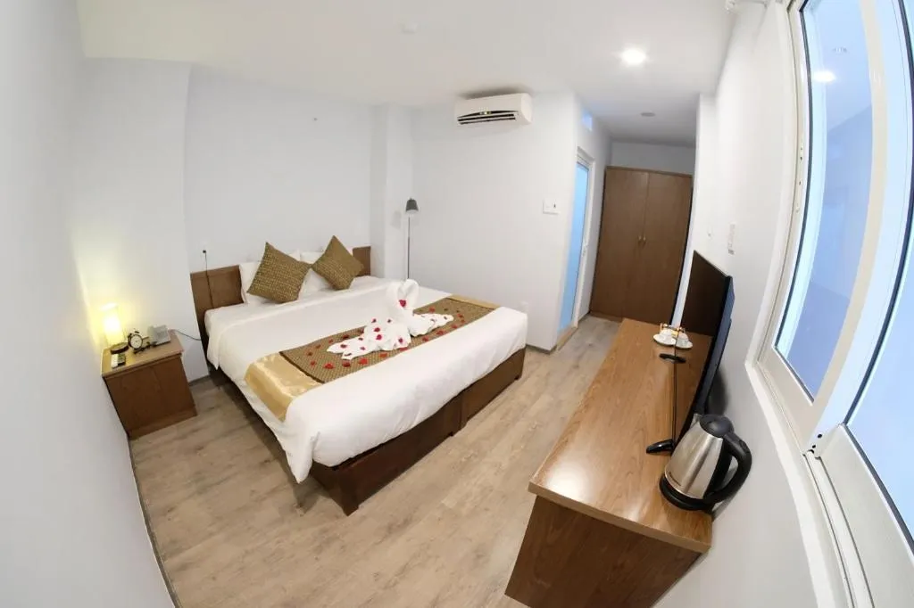 Bed in The Umi Hotel