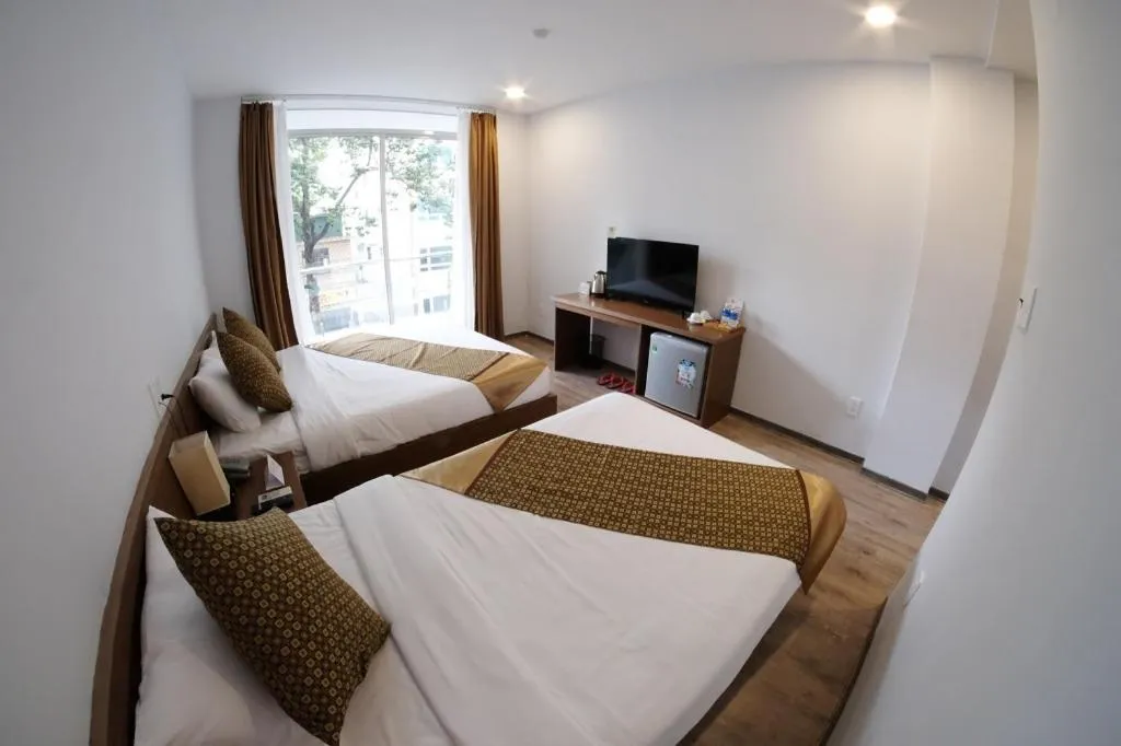 Bed in The Umi Hotel