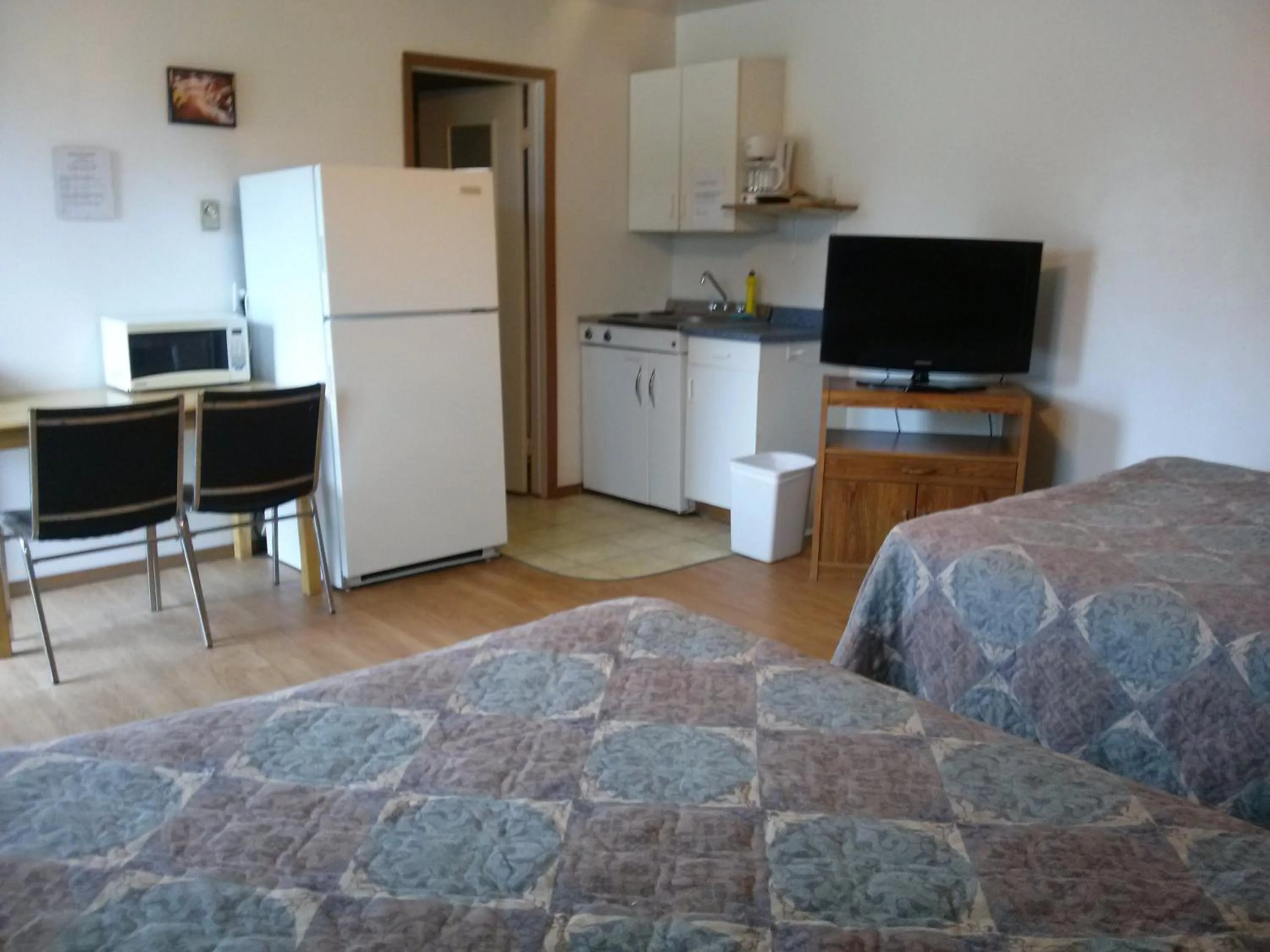 Bed in Moosomin Motel