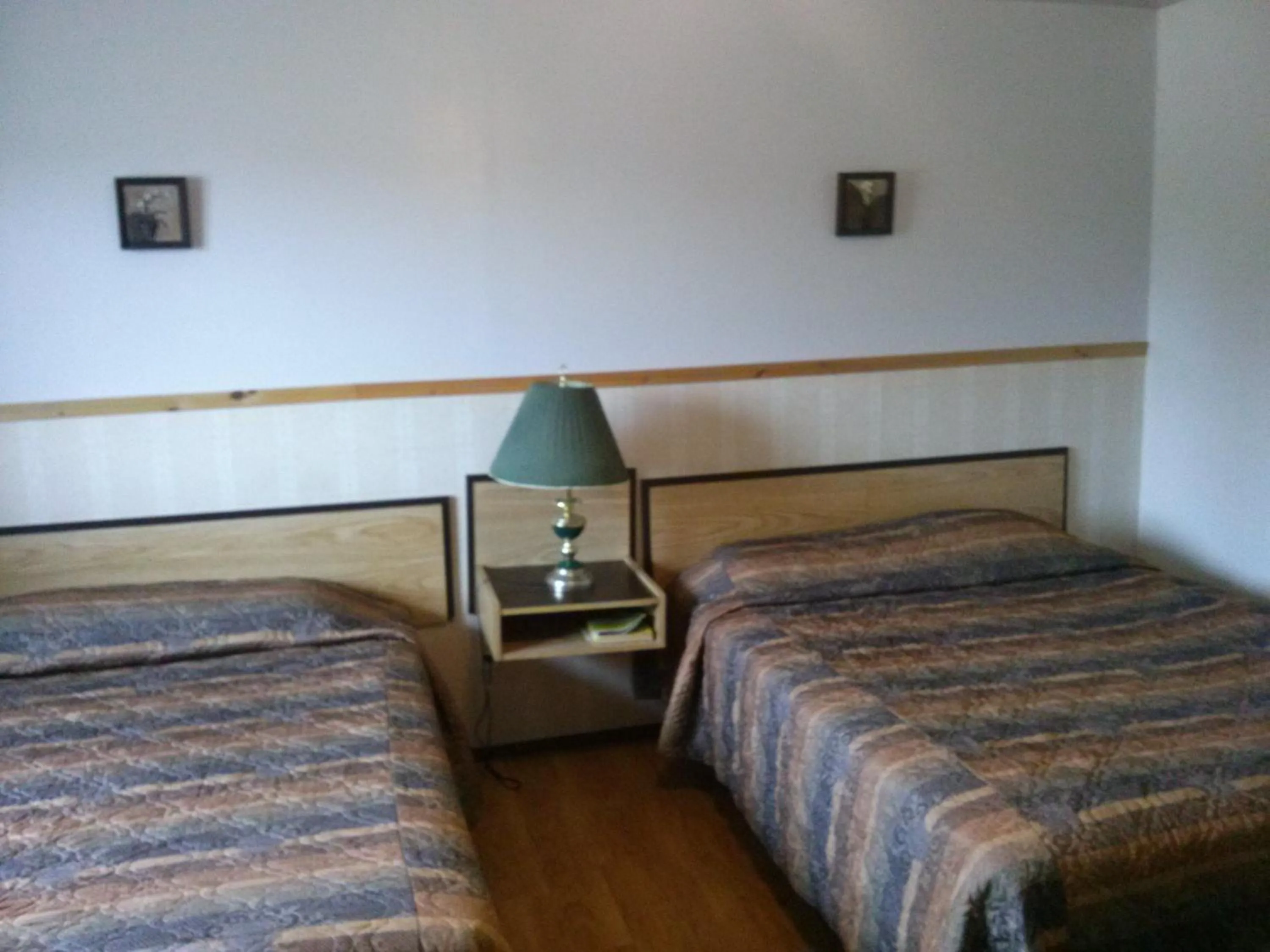 Bed in Moosomin Motel