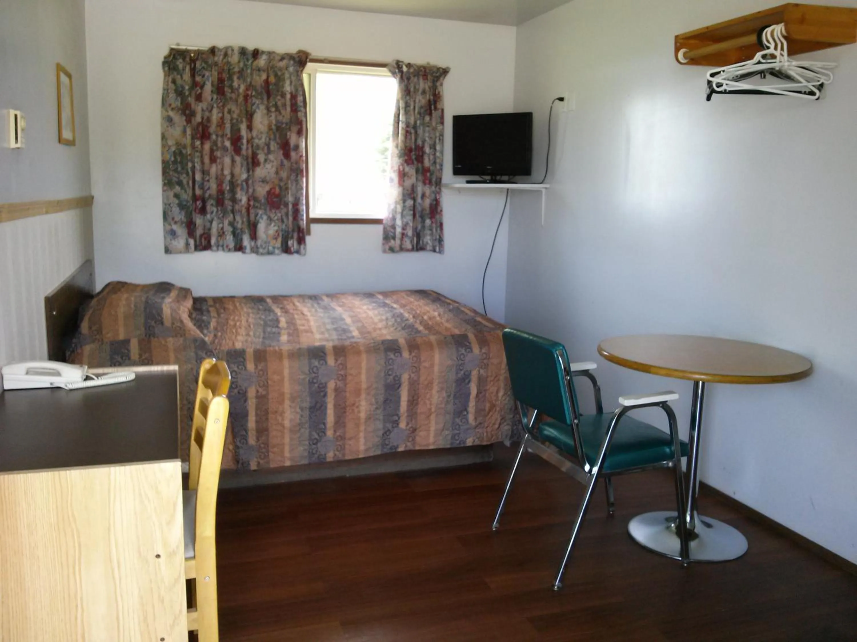 Bed in Moosomin Motel
