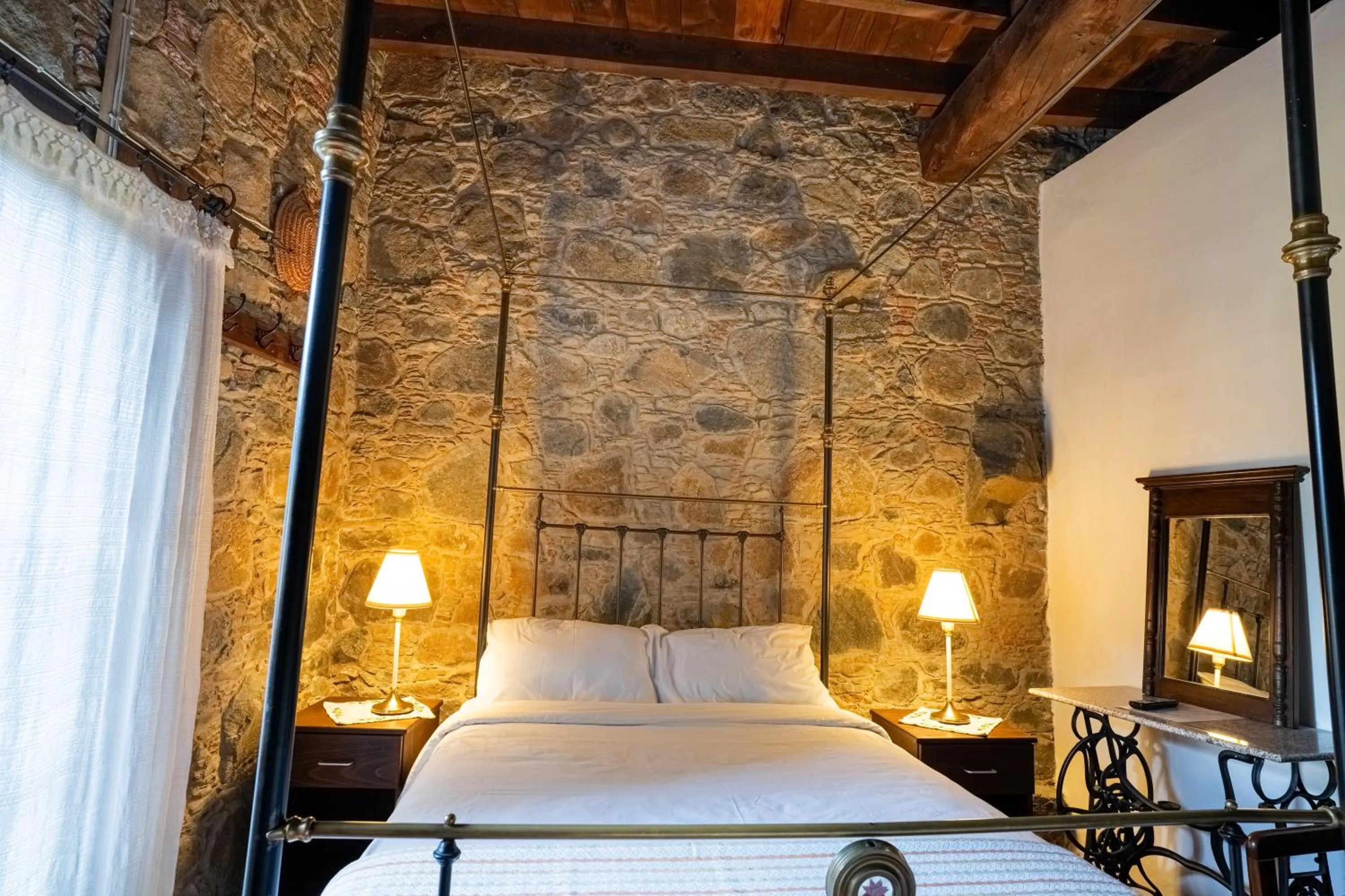 Bed in Ambelikos Traditional Agrohotel