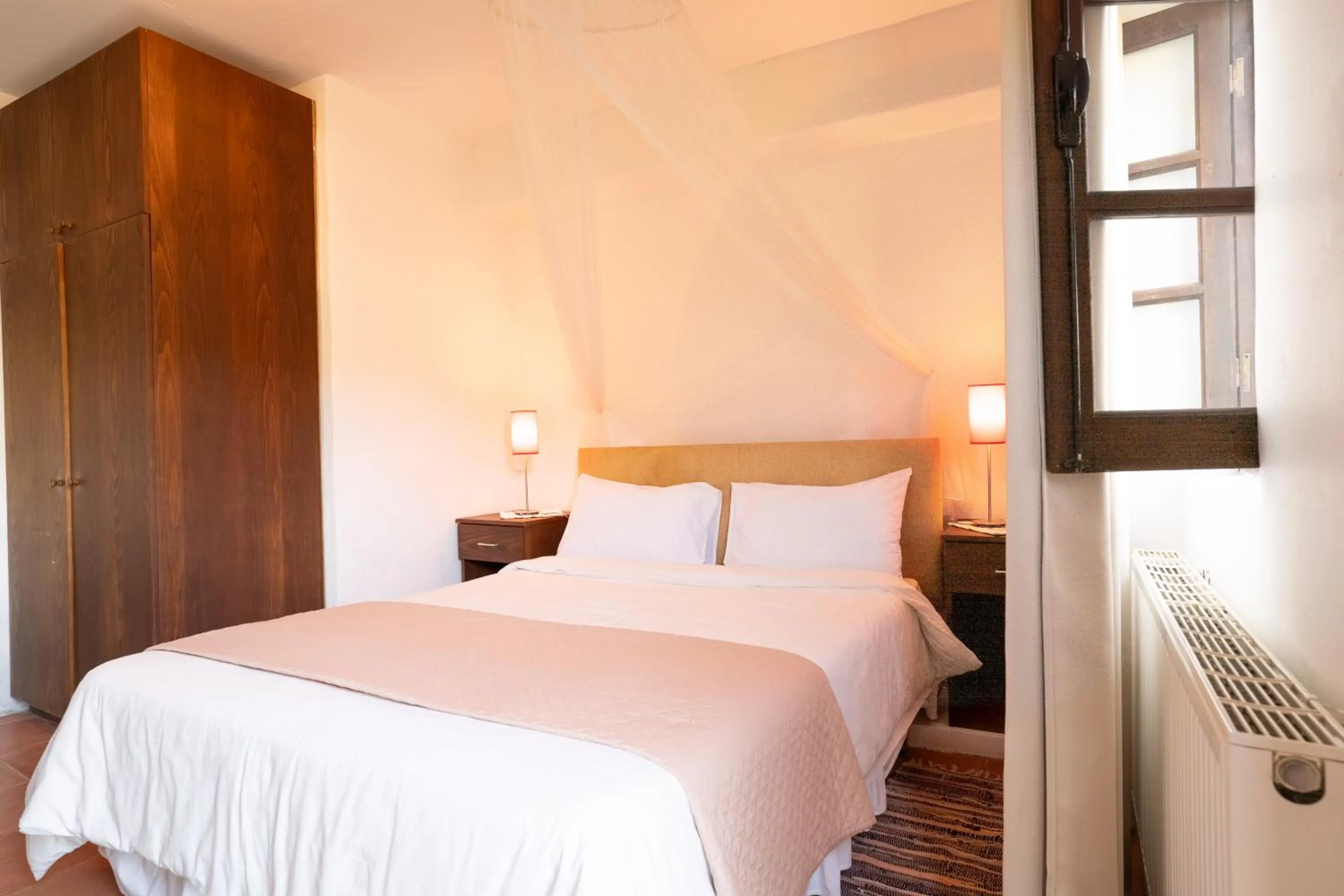 Bed in Ambelikos Traditional Agrohotel