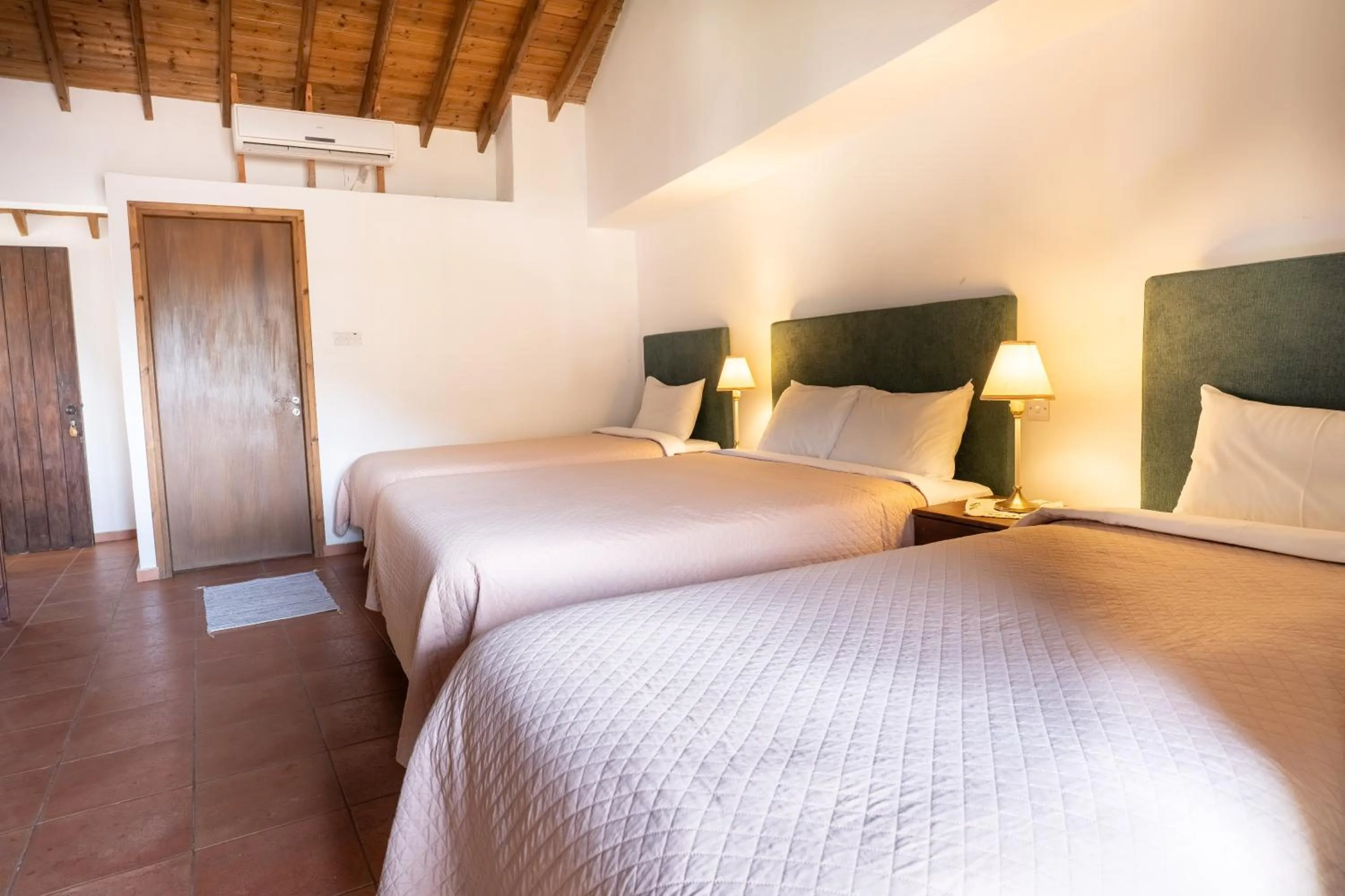 Bed in Ambelikos Traditional Agrohotel