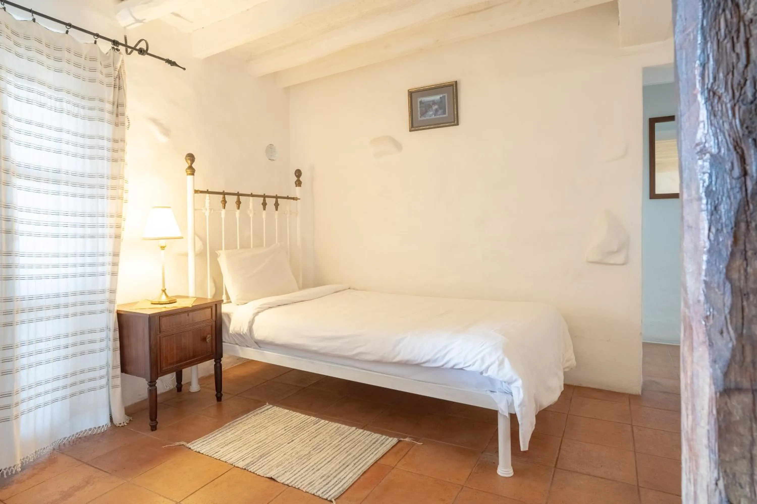 Bed in Ambelikos Traditional Agrohotel