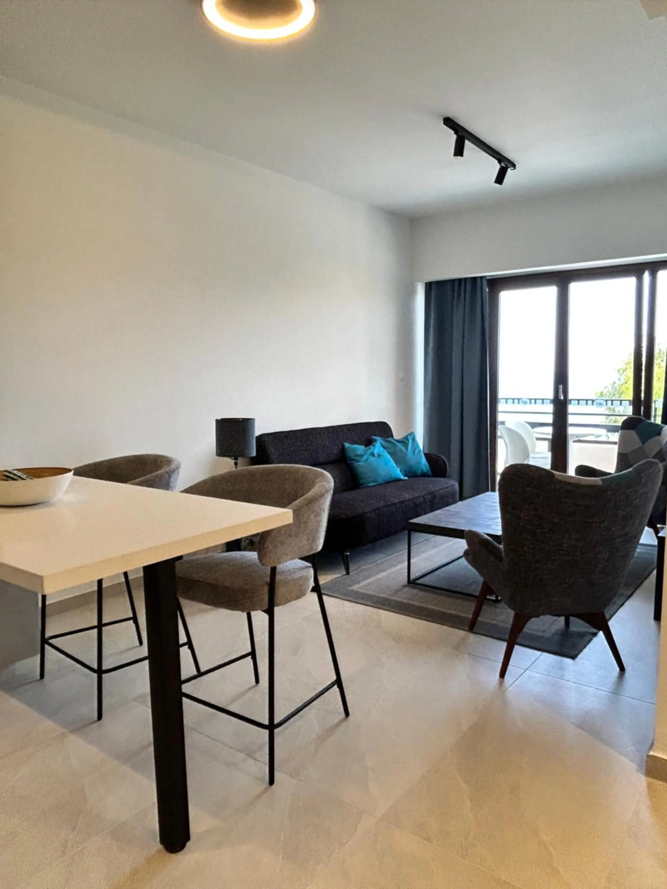 Living room in Pigeon Beach Hotel Apartments