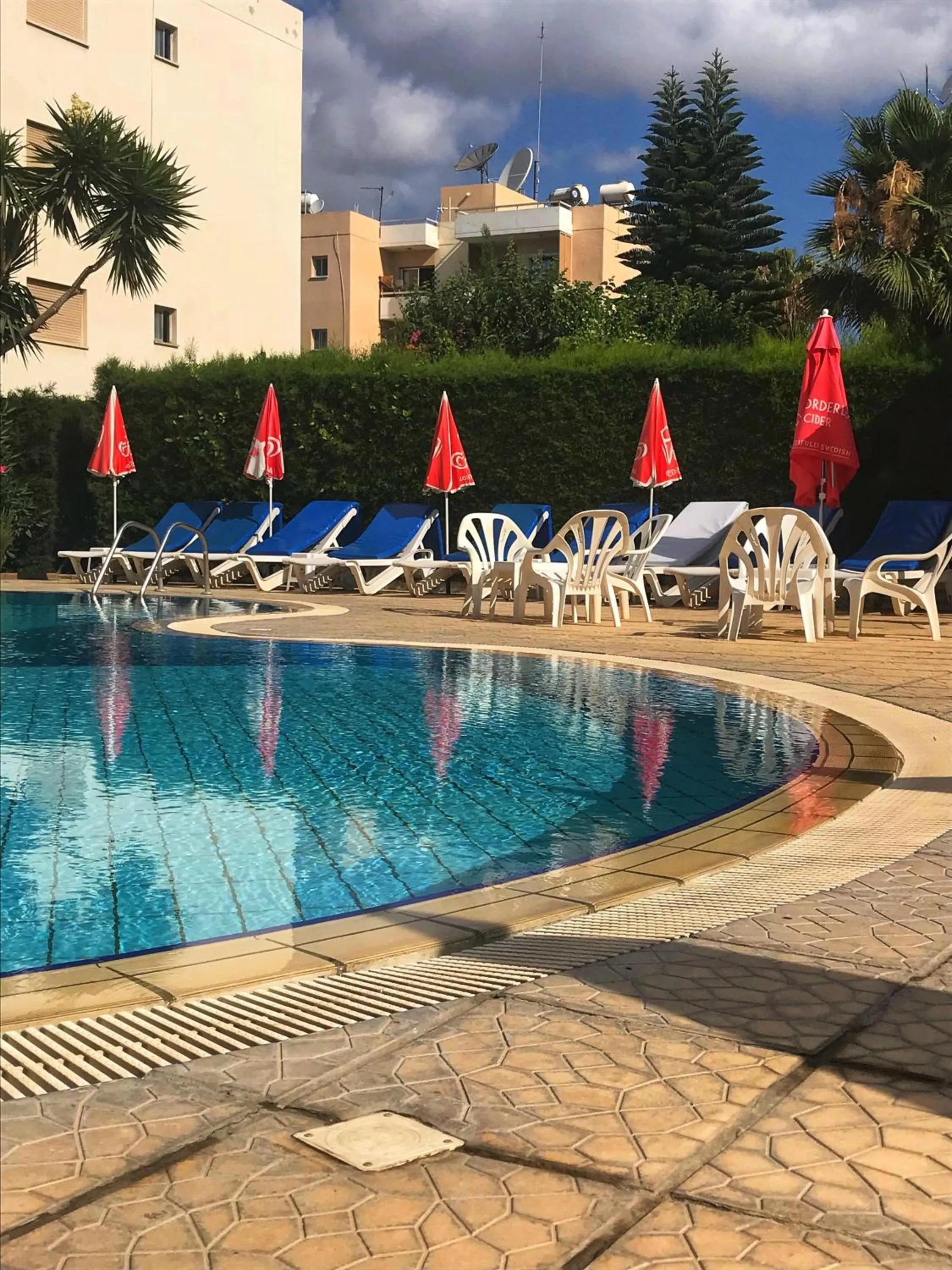 Swimming pool in Pigeon Beach Hotel Apartments