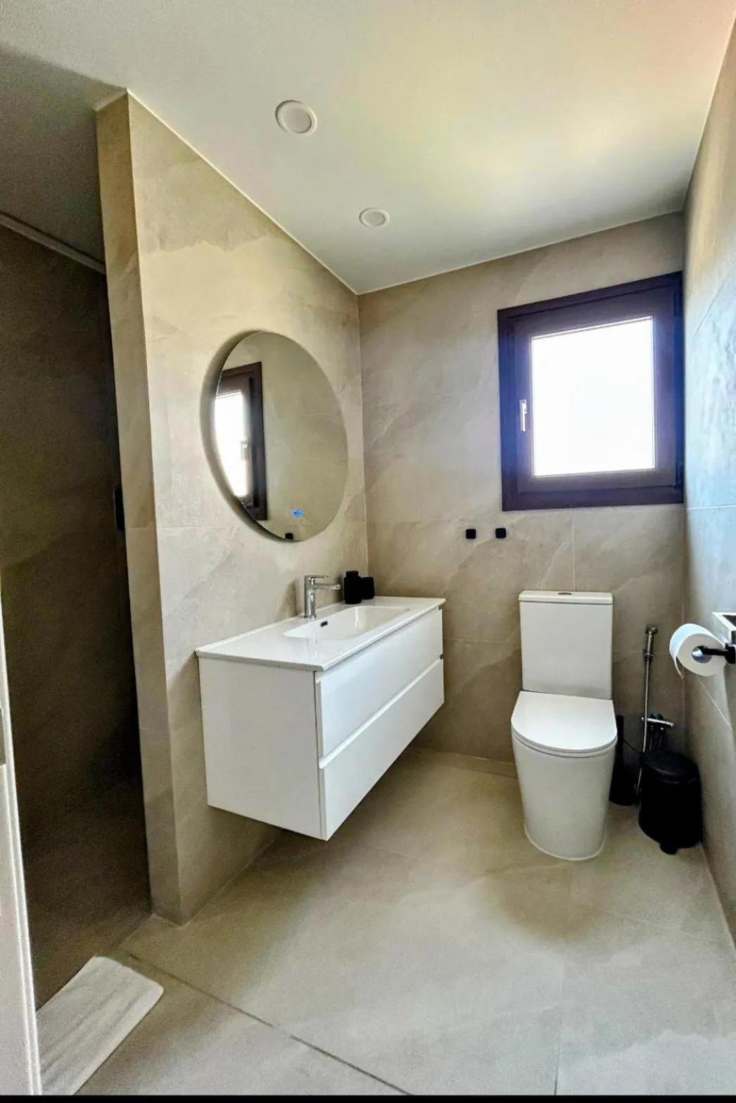 Toilet in Pigeon Beach Hotel Apartments