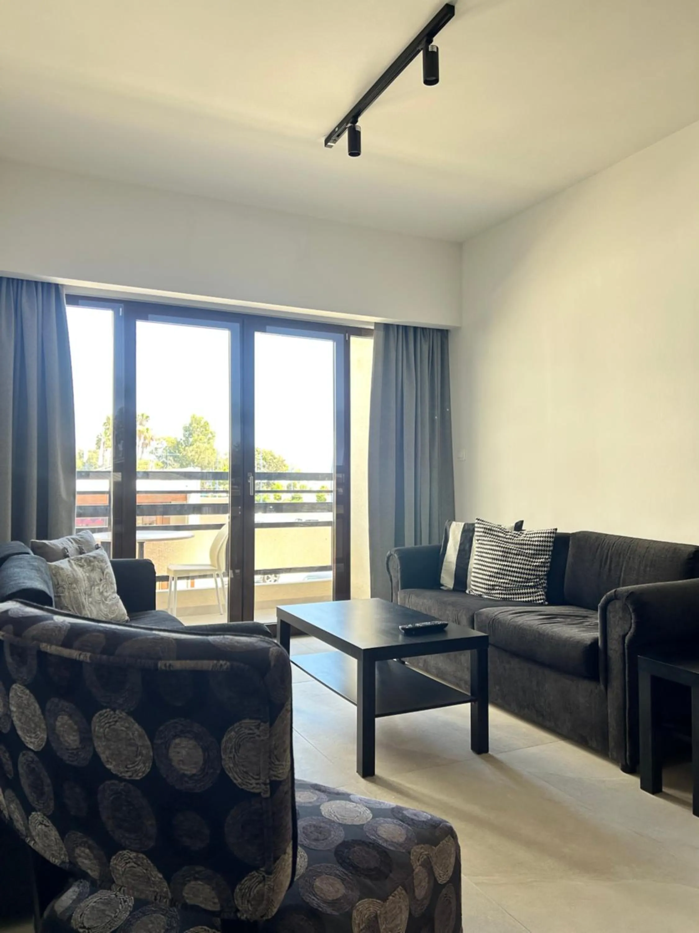 Living room in Pigeon Beach Hotel Apartments