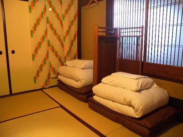 Bed in Guest House Kingyoya