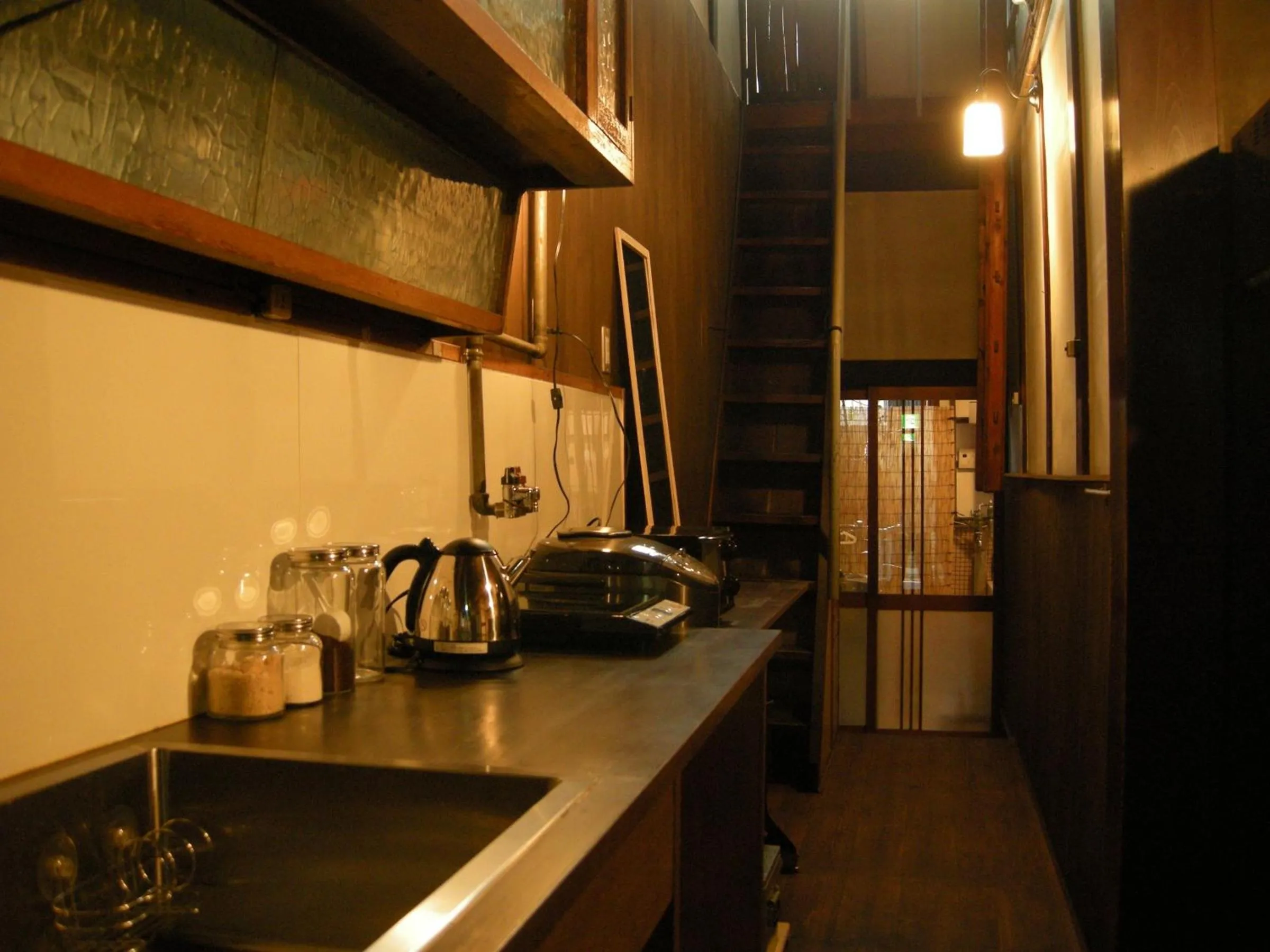 Communal kitchen in Guesthouse Itoya Kyoto