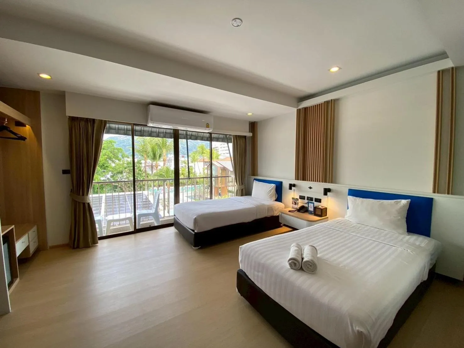 Bed in Armoni Patong Beach Hotel