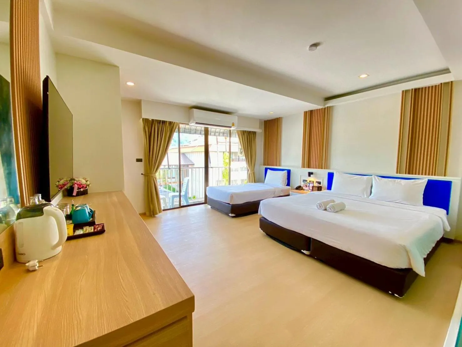 Bed in Armoni Patong Beach Hotel