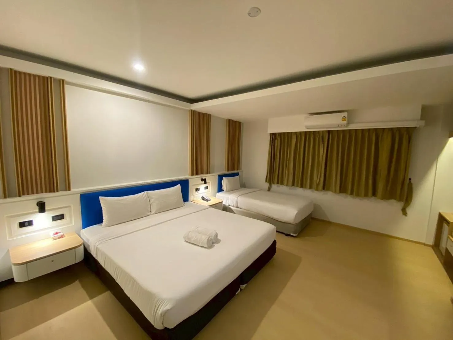 Bed in Armoni Patong Beach Hotel