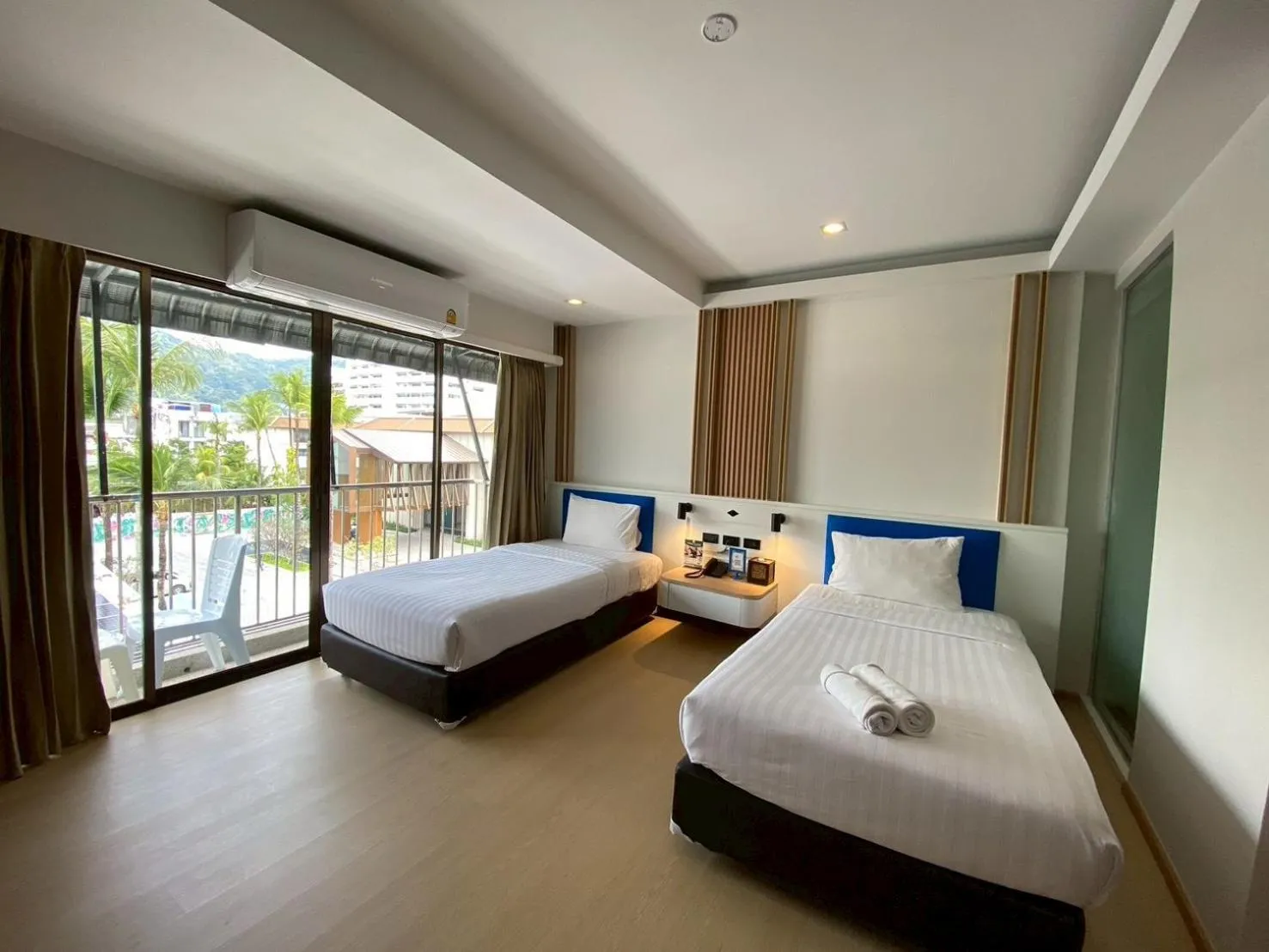 Bed in Armoni Patong Beach Hotel