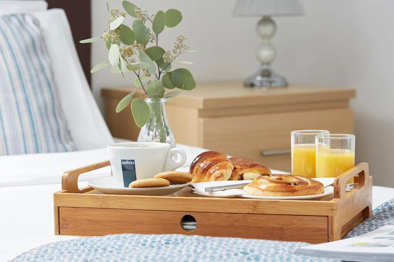 Bed in Luccombe Manor Country House Hotel