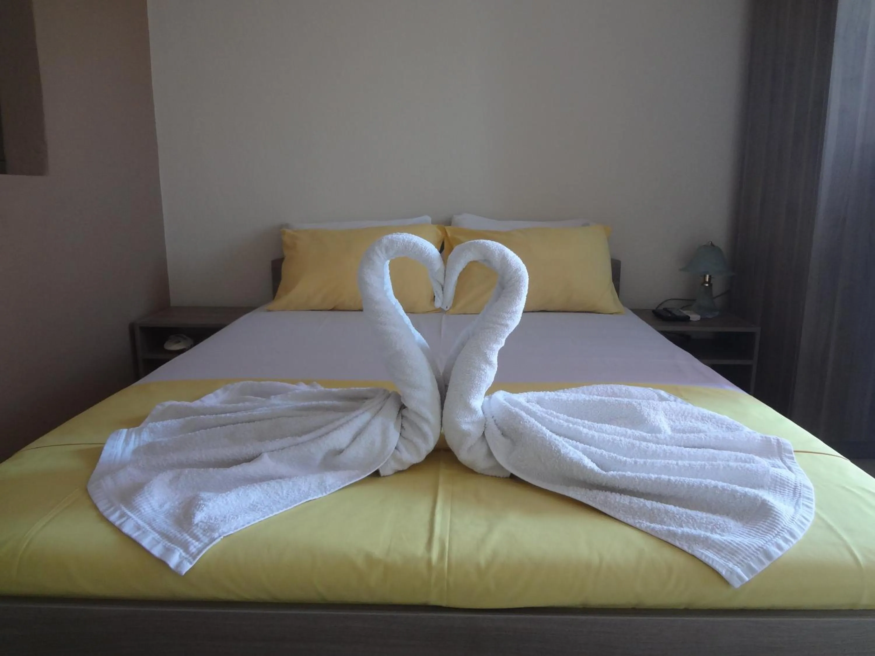Bed in Nostos Apartments