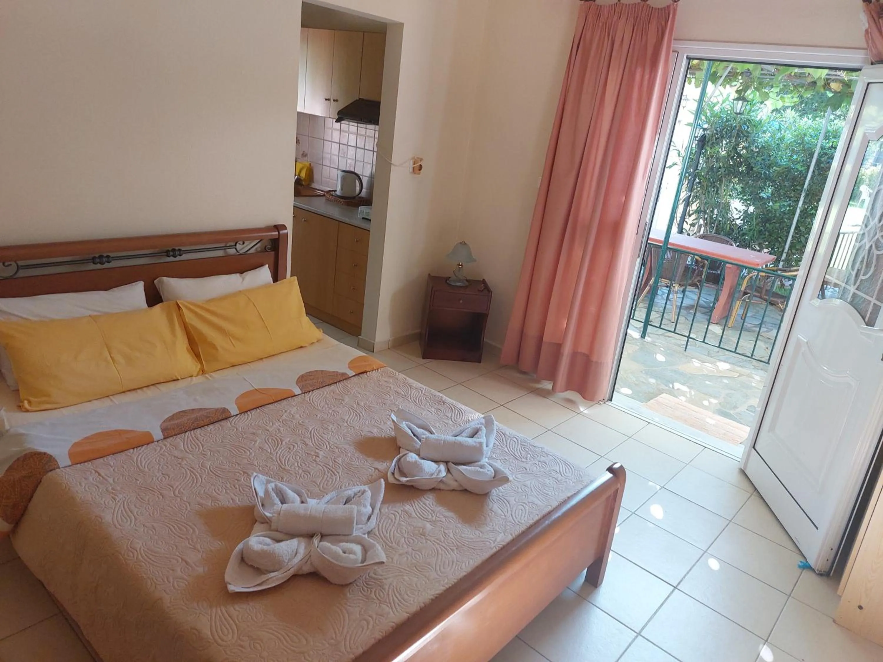 Bed in Nostos Apartments